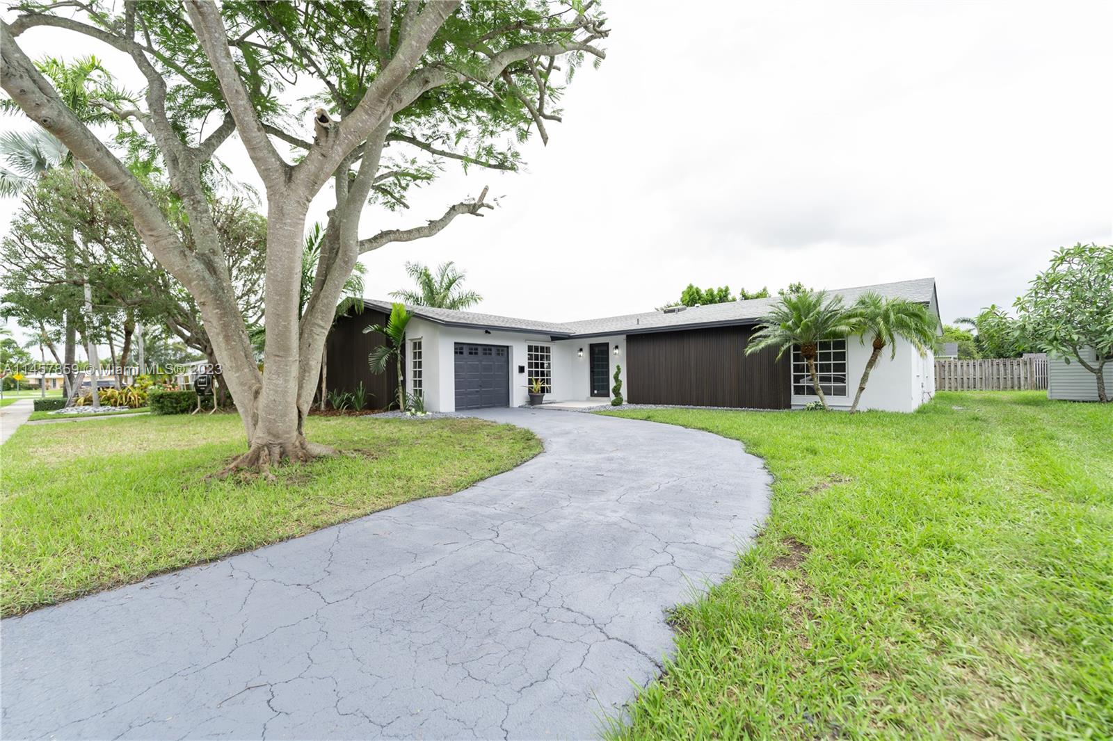 Newly Remodeled Gem Home on a quiet and family oriented cul-de-sac. This stunning Home features open layout Grand Kitchen with definite WOW effects. With a Modern Oasis feel, the interior has been carefully crafted to enlighten the senses from all aspects and every angle. New flooring, Freshly painted, State of the Art Smart Kitchen Appliances, gorgeous modern bathrooms with floating vanities, Sky lights, new 5 ton A/C and MORE! This home is elegant, sleek and captivating. Enough space for Boat or RV. Will not last, call to make this your home today. Can Include Pool drawings for new Pool.