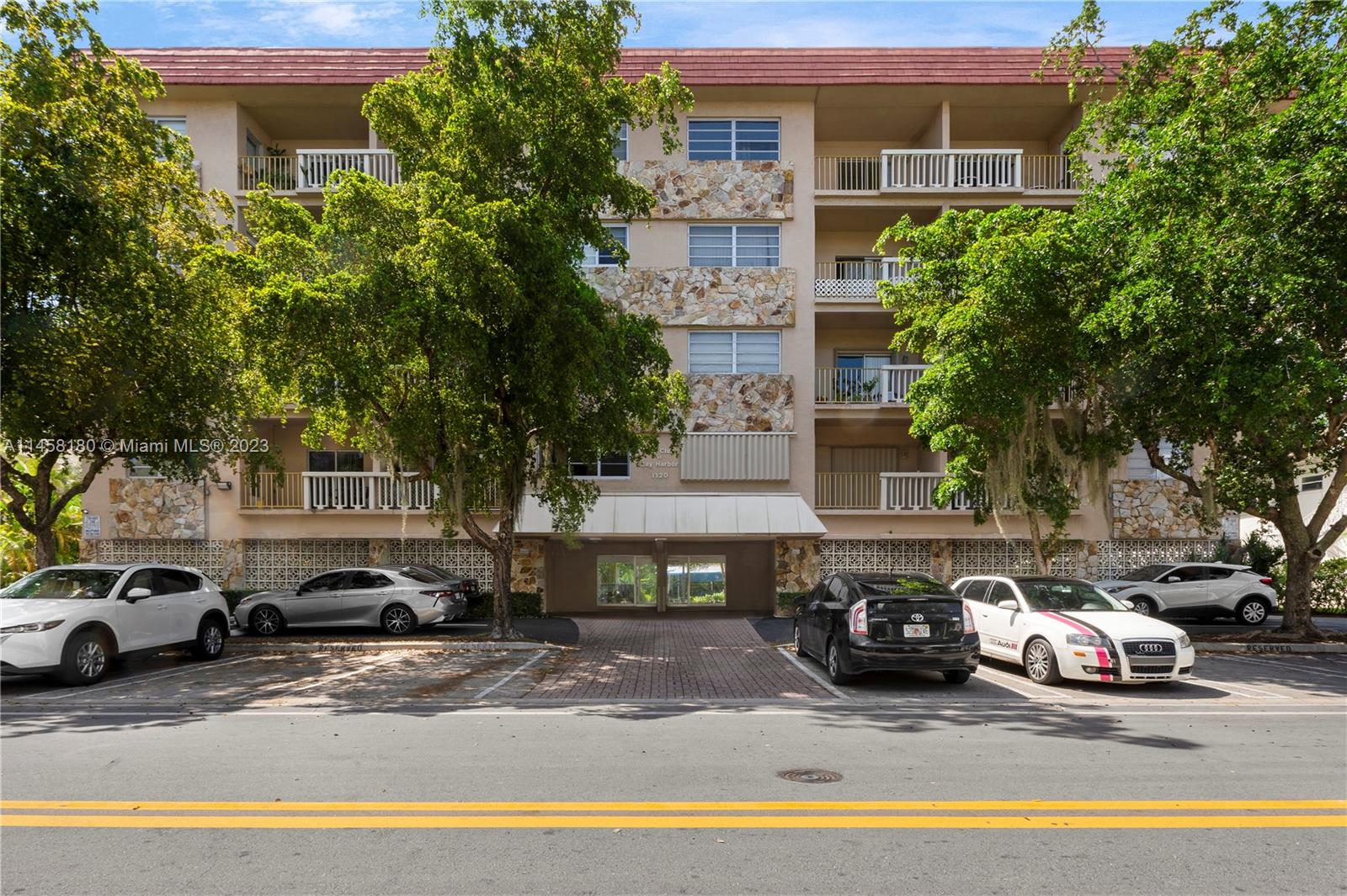 Discover this stunning corner unit in Bay Harbor Islands! This spacious 1-bedroom, 1.5-bathroom property features impact windows, granite countertops, professional blinds, tile floors and a washer and dryer. Your view is of the city’s recreational park. Being so close, you have plenty of options for outdoor activities. The condo even has its own pool. One parking spot and additional storage is included. A brand new AC system has been installed.