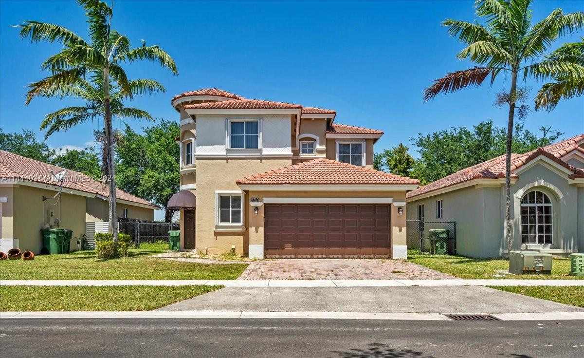 Two-story townhome in the heart of Homestead, located in Ventanas del Sol a well-maintained gated community. This home features 5 spacious bedrooms, 3 bathrooms, and 2 car garage. One of the bedrooms is located downstairs which makes it great as an office or guest bedroom. The master bedroom offers a gorgeous master closet and bathroom attached to it. The home has both a family and living room great for entertaining guests and a separate laundry room. The kitchen is well maintained with all stainless steel appliances and large counter space. The formal dining room features a skylight with remote control access to open and close the shutters. The french doors that led to the back patio are impacted windows. Restaurants, shops, and a turnpike entrance are nearby.
