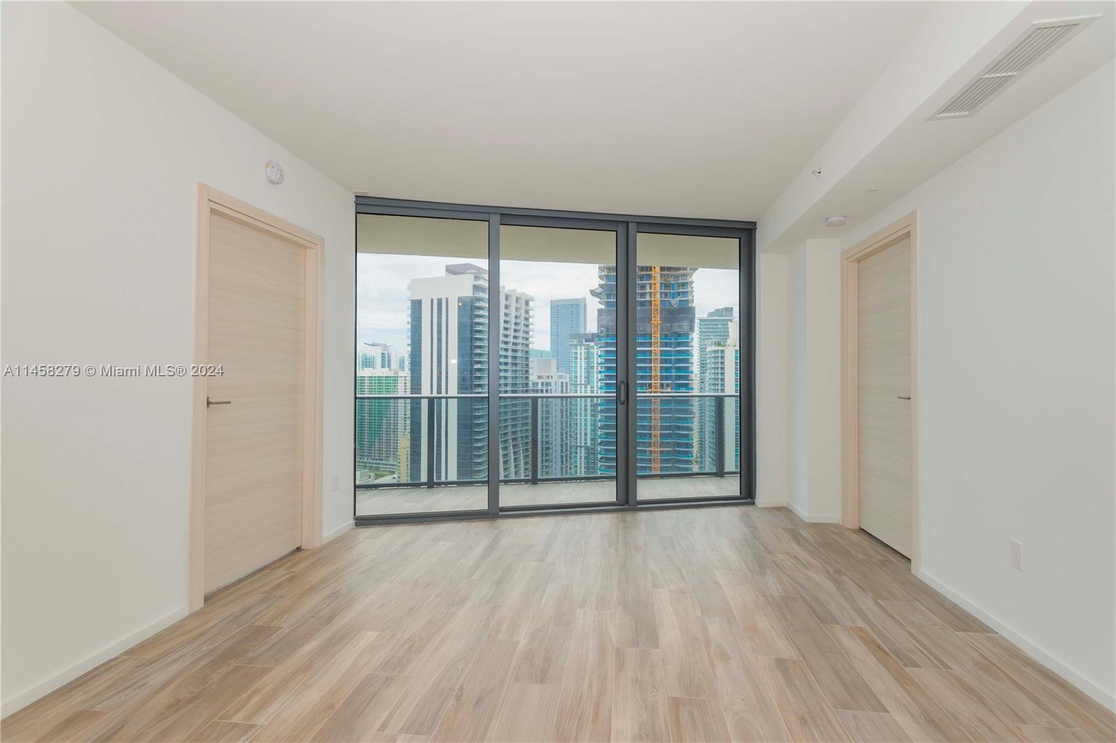 Discover opulence and Penthouse Living on the top of the 54th floor at SLS LUX, Brickell's gem. The unit offers 2BR, 2.5BA, and a Den and over 10 ft Ceilings ( vs 9ft for units under the 49th floor) seamlessly blending style, space and modernity. A private foyer elevator ushers you into a realm of elegance, showcasing an oversized balcony with stunning Bay and City views and surise and sunset . The modern kitchen boasts Wolf appliances and Italian cabinetry. Top-tier amenities include a 59th-floor rooftop sky pool, Sky Bar, state-of-the-art fitness center, and spa. Embrace resort-style living with tennis courts, renowned restaurants directly onsite, and endless recreational facilities. Enjoy the 5-star services of hospitality while being home and the sleek design of Yabu Pushberg