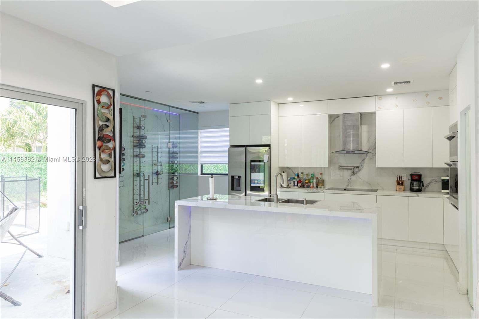 Welcome to your dream home! This meticulously renovated property offers contemporary elegance, a spacious floor plan, and a range of amenities that make it a true gem. Upon entering this modern haven, you'll be greeted by the seamless integration of contemporary design and comfortable living, smart connected which includes appliances, lights and cameras. The open-concept living spaces are bathed in natural light, creating an inviting atmosphere. One of the standout features of this property is the bedroom and a full bathroom on the ground floor. This offers flexibility and convenience for guests or multigenerational living arrangements. Total of 5 bedrooms, 3 full baths, laundry room, and a private pool. As an added bonus, a pond underneath the staircase, a must see.