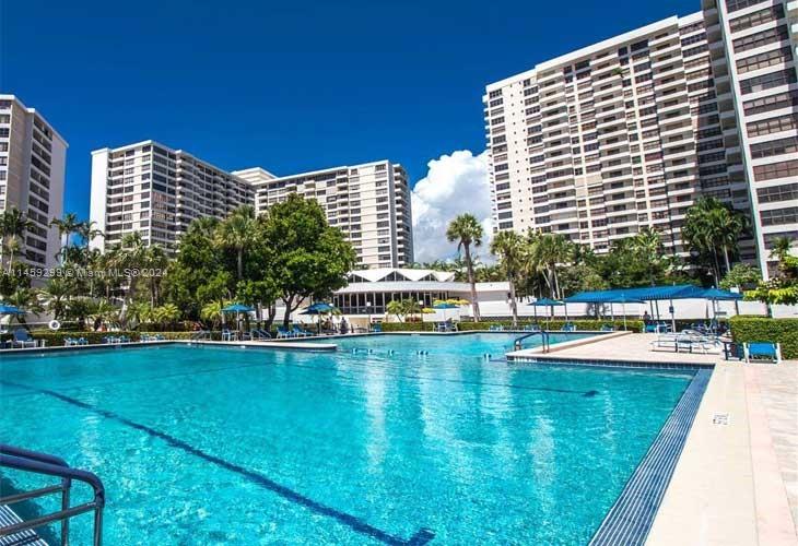 LOCATION, LOCATION, close to the beach, shopping, horse races, casinos, restaurants, and places of worship. Great as an investment, or vacation home.
This unit has a bright and spacious one bedroom plus living room unit (convertible to a second bedroom) and two full bathrooms. Large balcony with views of the garden and marina.
 Olympus is a resort style community .Offers 16 Acres w/2 resort style Heated Pools, 5 Tennis Courts ,Brand New Million Dollar Fitness Center, BBQ Area, Marina with Dockage at a Low Fee. Complimentary Courtesy Shuttle to Beach & Stores.  Maintenance includes Basic Cable, Laundry Facilities On Every Floor, Front Desk Concierge, Security, Valet and Bike Storage.