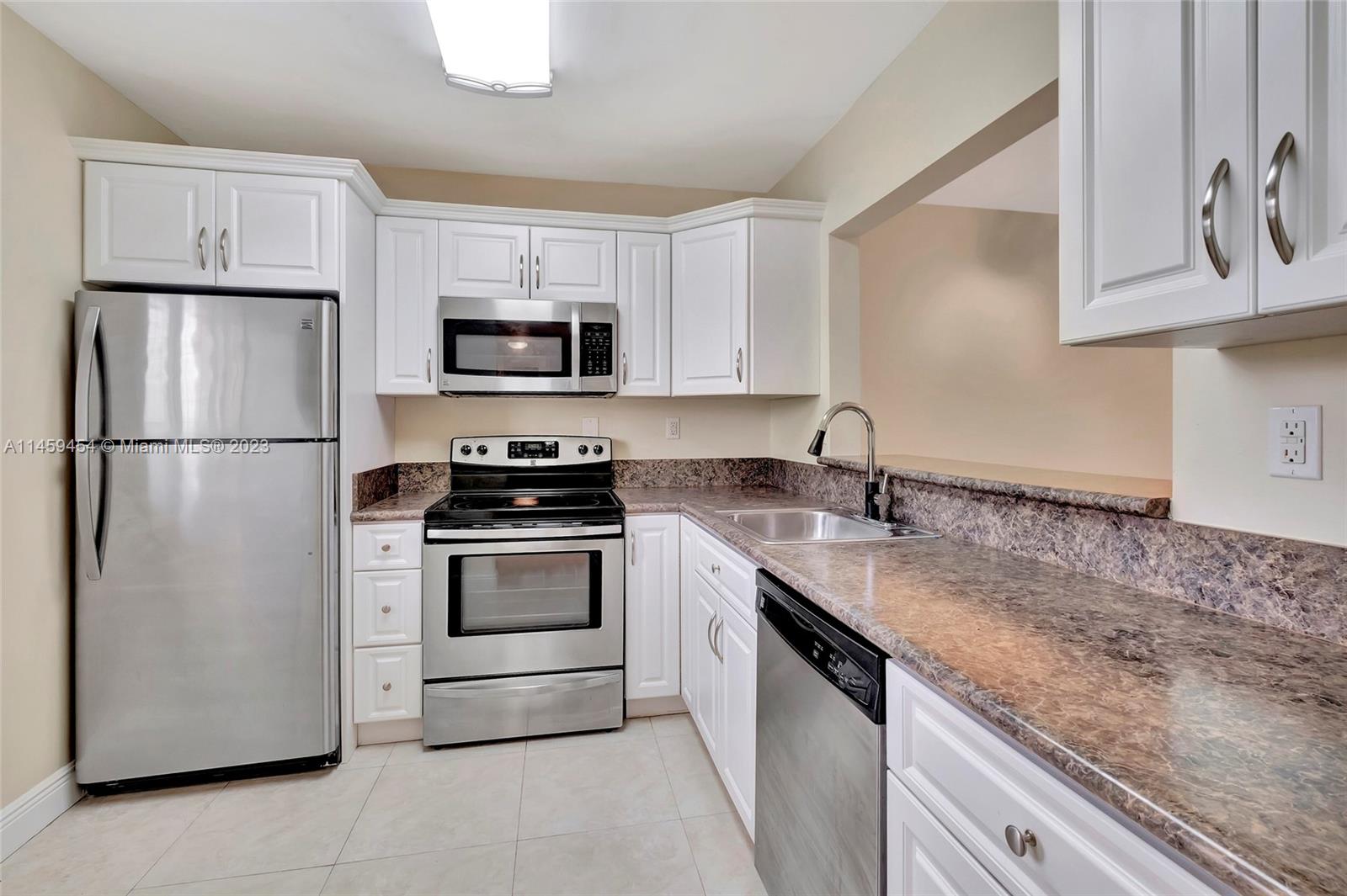 Discover a haven of convenience and comfort! This renovated condo on the 4th floor offers serene topiary views. Freshly painted, tiling throughout, incl. all-new impact windows and doors, kitchen cabinetry with an addl pantry + expanded kitchen passage. Extra closets. Spacious bedroom boasts a generous walk-in closet w a raised ceiling for extra space + a 2nd closet. While the updated bathroom adds a touch of luxury. The building is getting a fresh coat of paint. Located near Dadeland Mall, Palmetto & 874 expy, US1, Metrorail, bus stations, Baptist Hosp and the airport, you're always connected. Enjoy a well-maintained community with tennis courts, gyms, pools & clubhouse+. Parking is easy and theres 24/7 security. With $4M in reserves and NO spec. assessments, seize this prime opportunity!