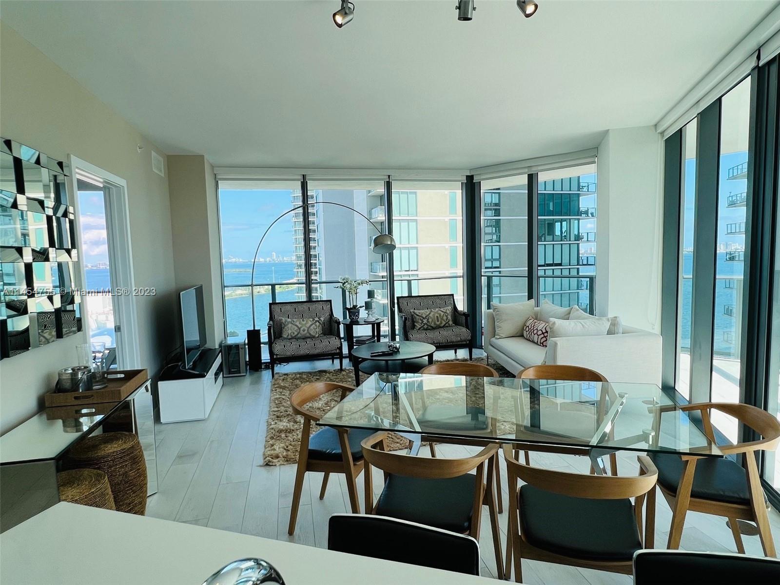 Modern, comfortable, and bright Furnished 3 Bedroom/2 Bathroom Corner Condo in Paraiso Bayviews, featuring beautiful views of Biscayne Bay and downtown; wood-like tile floors in living room and bedrooms, Italian kitchen cabinetry, spacious wrap-around balcony. Paraiso Bayviews by Karim- amenities include: Party Room, Fitness Room and Spa with Sauna, Kid's Playroom, multi-purpose game room, pool, jacuzzi, BBQ grill area, Roof Top and more! Located in Edgewater, close to Midtown Shoppes, Wynwood, Design District; easy access to I-195/I-95, the airport, Miami Beach. Includes basic cable and internet, and 1 Assigned Parking Spot. Must See!