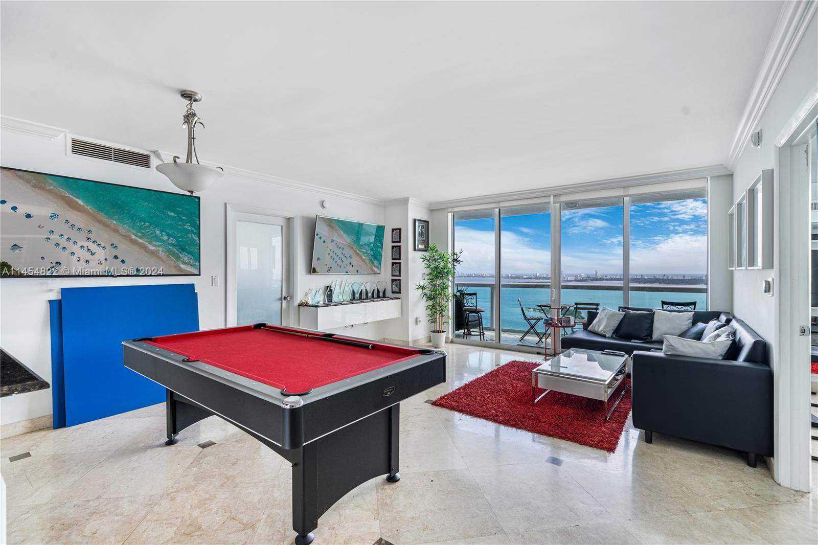 EVEN ON RAINY DAYS THESE VIEWS ARE MAJESTIC! Enjoy amazing panoramic views of Biscayne Bay from this gorgeous apartment in the sky! This 2 bedroom / 2 bathroom split plan condo has been upgraded to feature marble floors throughout the bedrooms and living areas, front loading washer/dryer, the kitchen overlooks the dining area with granite counter tops and top of the line stainless steel appliances. Beautiful pet friendly park in front of the building features a dog area, work out stations, tennis, volleyball and much more. Amenities at 1800 Club include a 2-story lobby, 24-hour valet parking, on-site waterfront restaurant, heated swimming pool, Zen garden, 2-story recreational floor with deck, gym, yoga/aerobics studio, sauna, steam room, massage rooms, party room and billiards room.