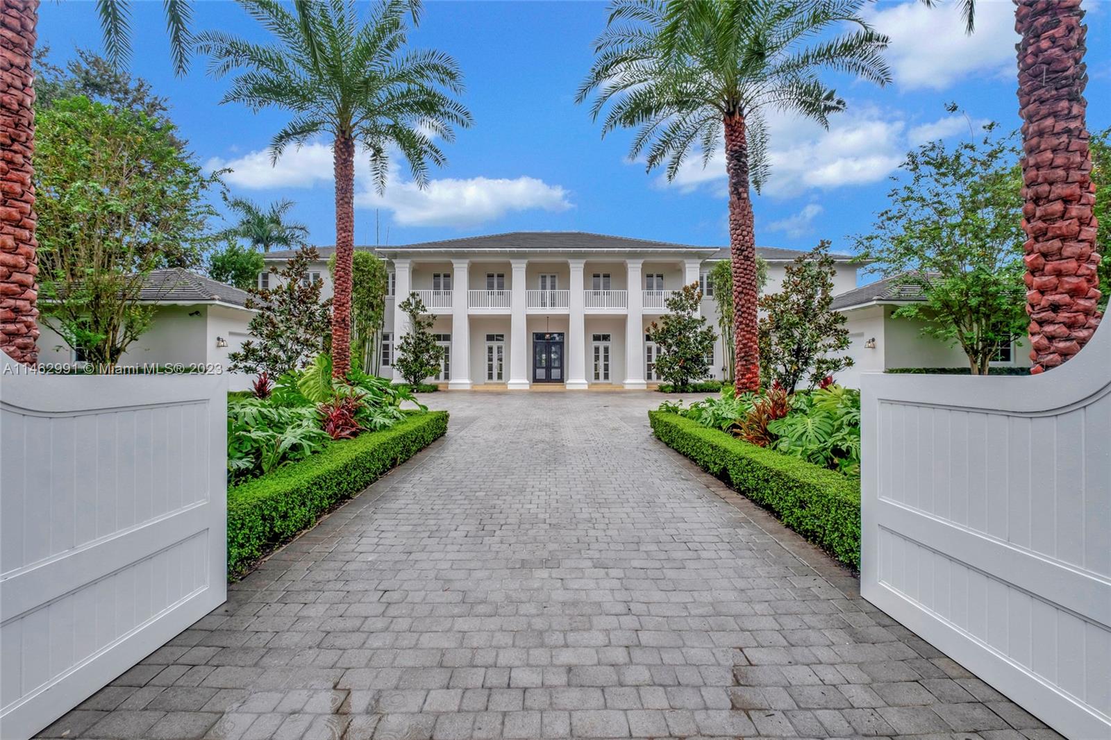 Elegant Colonial style estate was designed by renowned architect Cesar Molina. Located in the heart of the sought-after Ponce Davis neighborhood, this spectacular 2-story residence is surrounded by lush landscaping w/ Oak and Magnolia trees & tons of lightning. The amazing floor plan w/ 7 bedrooms, 8.5 bath features formal dining, living & family room overlooking gorgeous oversized pool. Limestone floor throughout & a 1/1 separate entry guest house w/ balcony. Spacious primary bedroom suite w/oversized closet, teak floors, his/hers bath & private balcony. Complete w/ an elevator, tiled 4-car garage, large pantry, butlers pantry, Wolf appl & more. Control 4 home automation, security system & gated entrance w/ tons of privacy. Steps away from world class schools, dining & shopping.