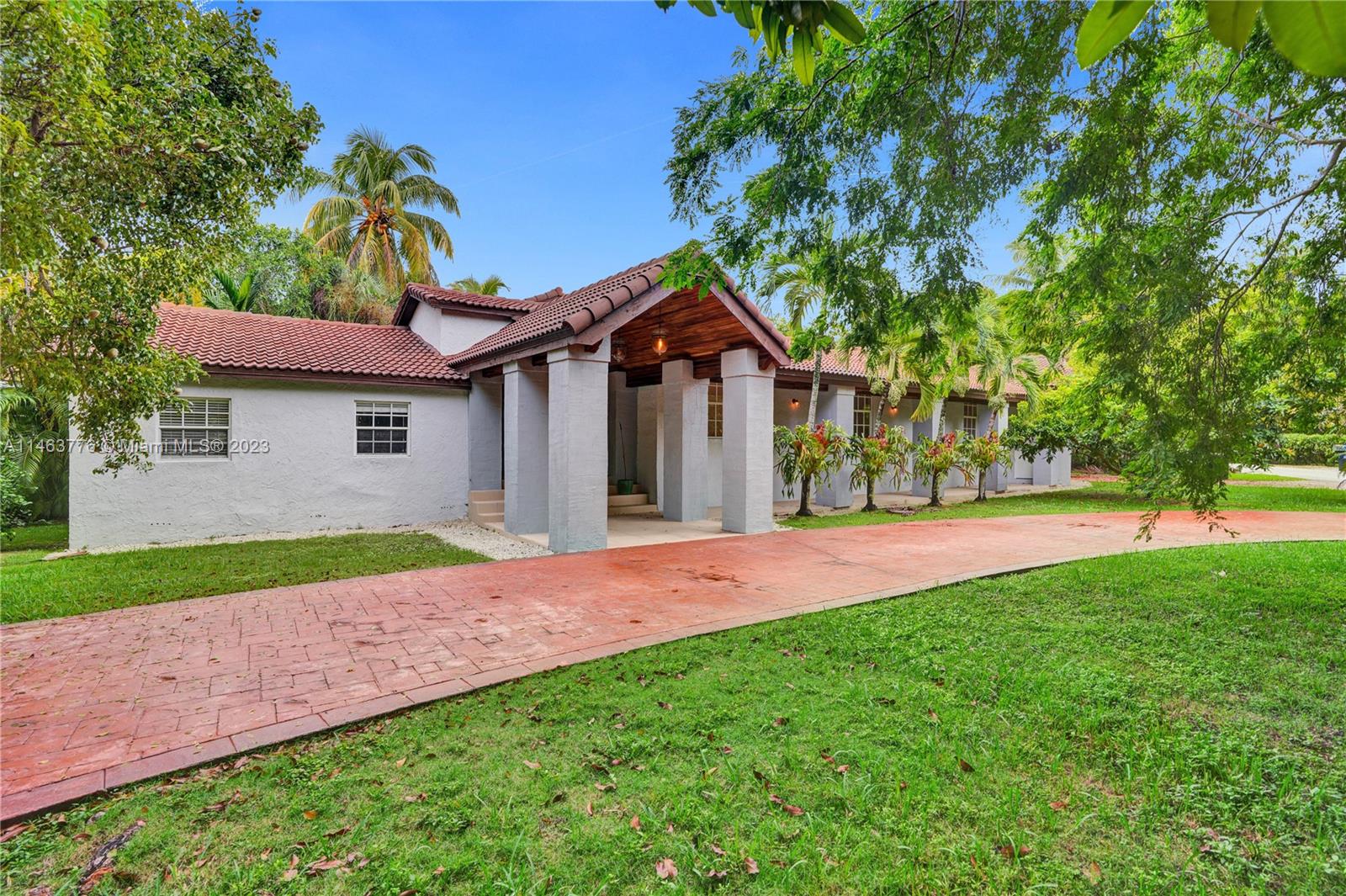 This spacious home is your dream oasis, boasting the perfect blend of comfort and style. Situated on a generous corner lot, it offers privacy and tranquility amidst lush tropical landscaping. Discover a thoughtfully designed interior featuring ample natural light and an open floor plan.The heart of the home is a beautifully appointed kitchen with modern appliances and a breakfast bar, perfect for gatherings with friends and family. With 4 beds and 3 baths, there's plenty of space. The main suite is a retreat in itself, featuring a luxurious en-suite bathroom and a walk-in closet. The large backyard provides a haven for relaxation, with plenty of space for a pool. Don't miss your chance to make this South Miami gem your own – schedule a showing today!