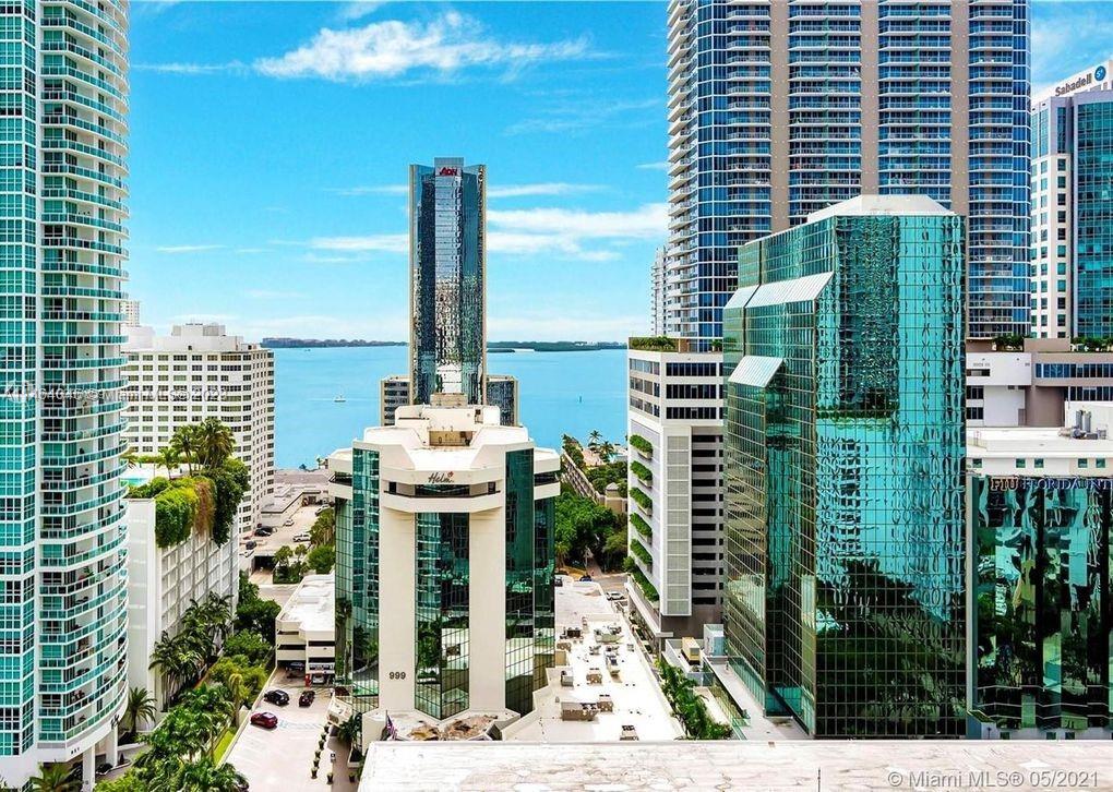 High floor and spacious corner unit, with 3B plus Den and private elevator. with 180 degrees of amazing views to Brickell & Downtown skylines. The balcony is ample and comes with bbq/summer kitchen. Most spectacular amenities 2 complete floors of entertainment, Indoor heated pool with retractable glass, parent/child pairing wristband system, state of the art gym & spa with steam baths, basketball & squash courts, jogging tracks, bowling & mini golf/simulator, game room, playground, movie theater, business & social rooms, valet, roof top & sun deck with views to die for, bar, pool & jacuzzi.