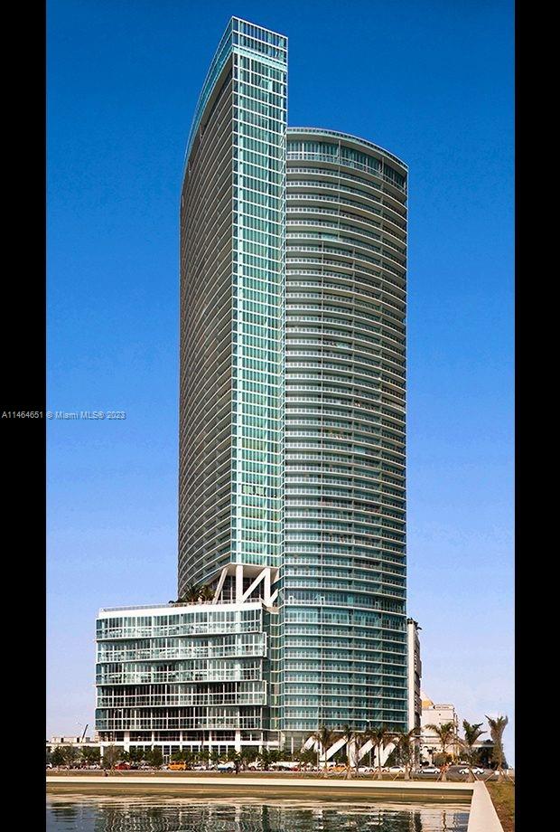 GREAT LINE IN THE POPULAR MARINALBLUE BUILDING ACROSS FROM KASEYA CENTER, AMAZING PANORAMIC BAY AND CRUISE SHIP VIEWS. FLOOR TO CEILING SLIDING GLASS DOORS FROM LIVING ROOM AND MAIN BEDROOM TO THE SPACIOUS BALCONY. LARGE WALK IN CLOSET IN MAIN BEDROOM. LARGE DOUBLE SINK, AND LARGE WET ROOM IN MAIN BATHROOM. THE DEN IS A BONUS! RENT INCLUDES BASIC CABLE, WATER, ONE ASSIGNED PARKING SPACE. TWO POOLS, FITNESS ROOM, BUSINESS CENTER, SAND VOLEYBALL COURT. CONVENIENCE STORE ON THE LOBBY LEVEL. VACANT