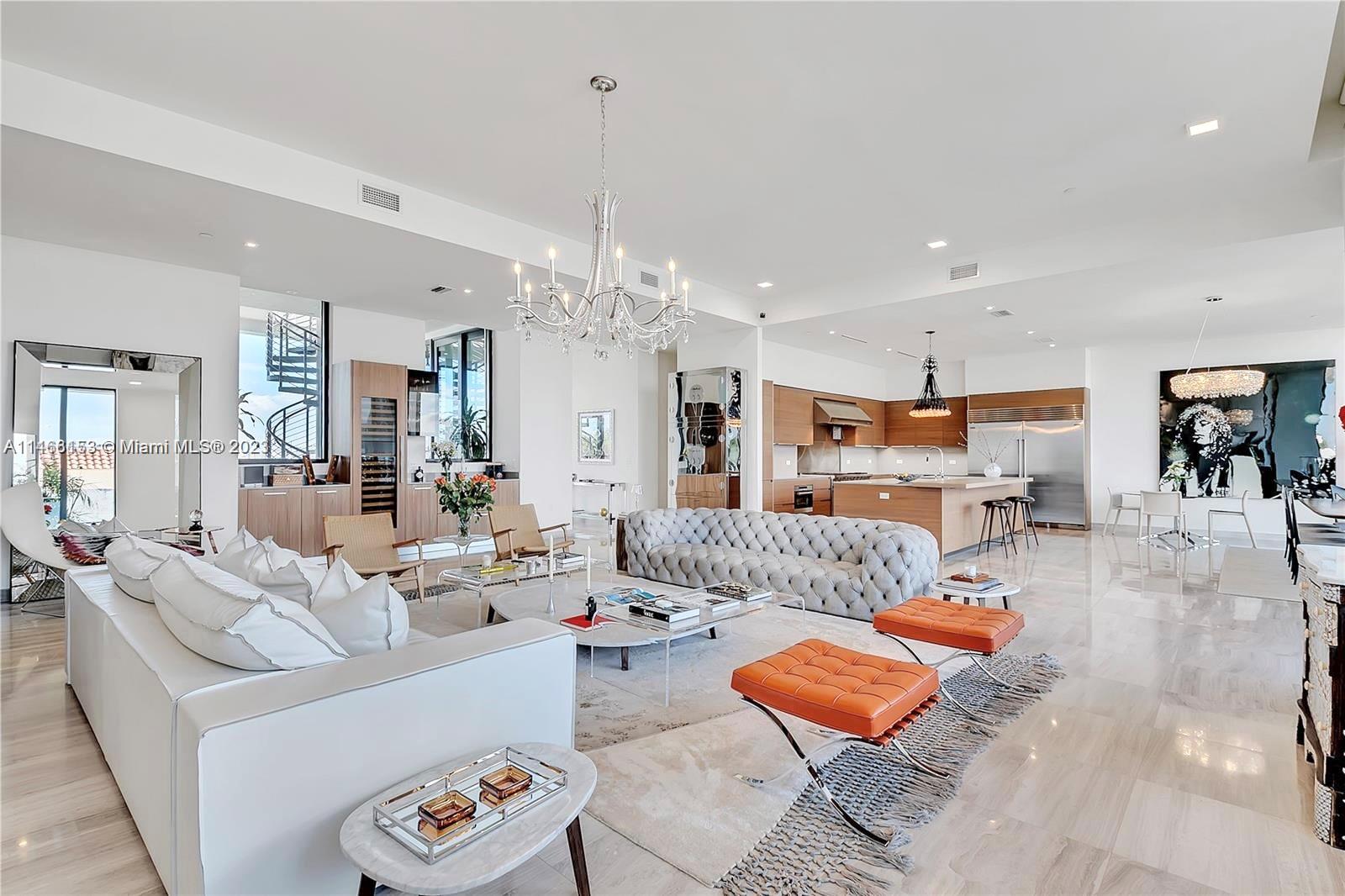 Experience the best boutique waterfront luxury living at The Fairchild in Coconut Grove. One of only 26 residences, PENTHOUSE 605 features a private rooftop, 5 bedrooms, 5.5 baths (including service quarters), 3,886 sq.ft. of living space+1,360 exterior areas, private elevator access. Offering 11-foot-high ceilings, natural stone flooring, gourmet chef's kitchen with Sub-Zero/Wolf appliances. Designed by world-renowned architect Max Strang, The Fairchild offers elegance and tranquility with resort-style amenities. These include a 24-hour concierge, a serene spa with Hammam, sauna, steam room, a fitness center, boat slips and a remarkable rooftop pool with private cabanas, summer kitchen, and breathtaking ocean views. Additionally, there are 3 covered parking spaces with potential car lift.