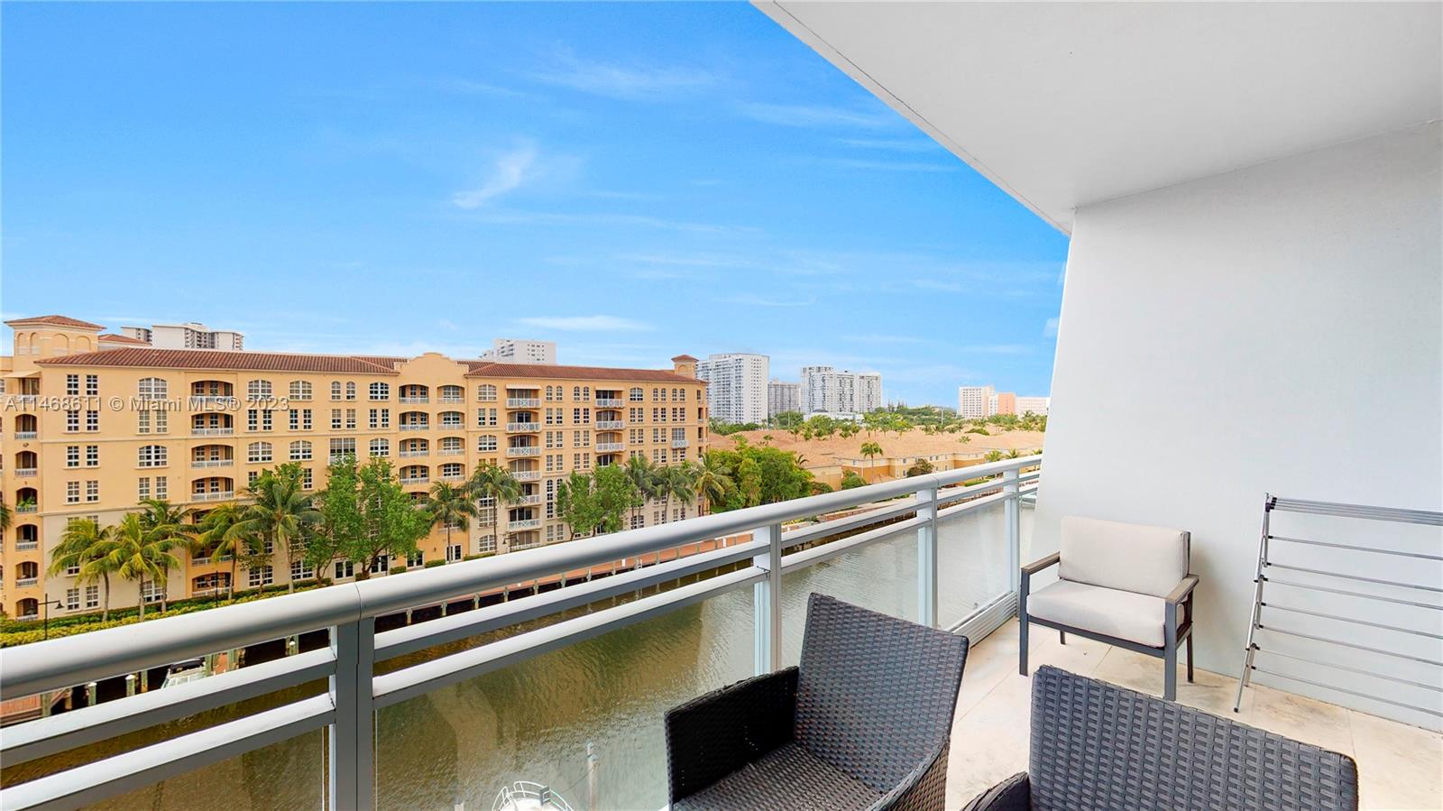 Elevate your lifestyle at the luxurious Artech Residences. This spacious condo is full of natural light, modern amenities, and creature comforts. The open-concept living/dining/kitchen space is grounded by floor-to-ceiling glass windows leading to a balcony allowing conversation to flow easily between areas while preparing meals in the fully equipped modern kitchen. Wake up to stunning views from the floor-to-ceiling glass wall leading to the private balcony space overlooking the skyline within the primary suite. Residents of the building can enjoy exclusive access to tennis courts, a pool, a spa, a fitness center, and a prime location within walking distance of parks, gardens, shopping, and the waterfront on Dumfounding Bay.