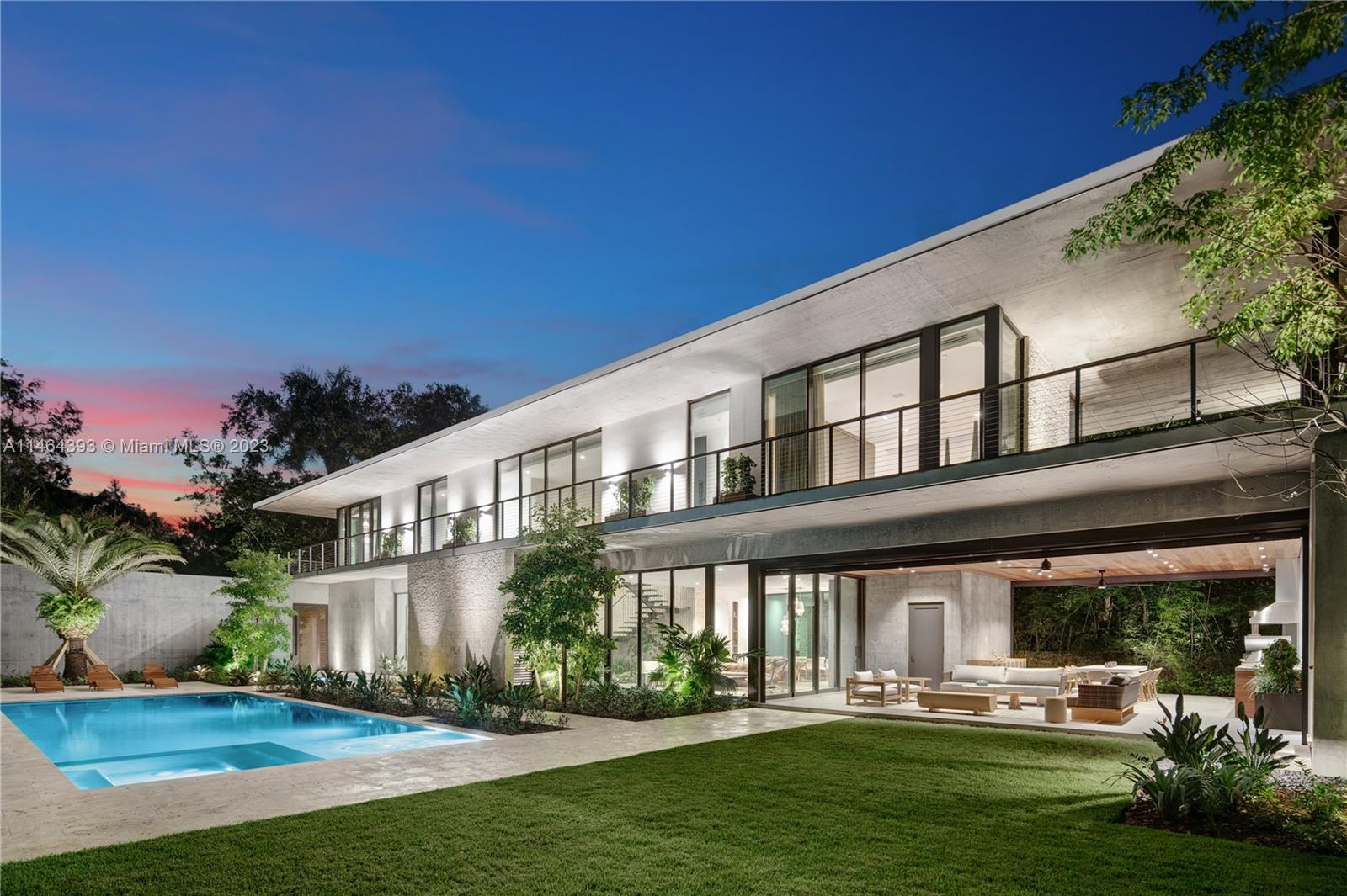 Welcome to a tropical paradise located in the exclusive Ye Little Wood gated enclave in Coconut Grove. This masterpiece of modern luxury, designed by [STRANG] Design, is a newly constructed 7500 sf 2 story, resting on a 21,600 sf Oasis. The home features 6 bd, 5.5 ba, kitchen by Designspace, ensuite guest bedrooms, private office &amp; detached guest suite. Indulge in ultimate outdoor living with wrap-around balconies, outdoor covered patio with summer kitchen featuring a grill &amp; pizza oven, retracting screen walls, pool &amp; spa. Featuring a full solar panel &amp; battery backup system by Tesla incl. Tesla car charging, Crestron lighting control, Sonos sound, camera security, Impact Glass, weather resistant materials, maids qtrs, workshop, storage, 2-car garage &amp; just minutes to the Village center.