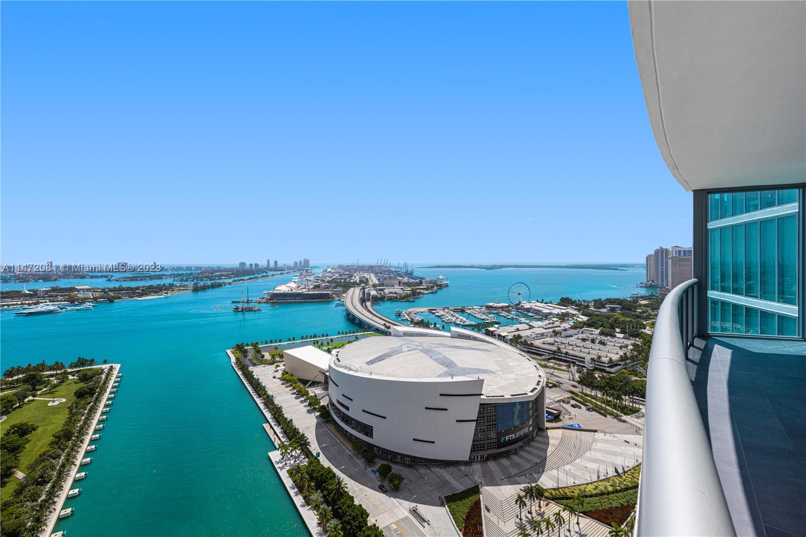 Enjoy luxury living with this spectacular Marina Blue condo. Direct water views of Biscayne Bay and Miami Skyline will make any resident live and work from home. With tiles throughout, along with modern baths, the open Italian kitchen cabinets and stainless steel appliances with Quartz countertop allows for easily entertaining family and guests; window treatments allow for privacy. Bldg amenities make this building an urban resort. Includes: sunrise and sunset pools, Jacuzzi, Volleyball, Golf putting, BBQ, Fitness Center, Sauna, and Lounge Room, 24hrs valet, security, and concierge. Walking distance to Arena, Bayside, Museums, Performance Center, and minutes to Brickell, Beaches, Design District, Gables, and Airport.