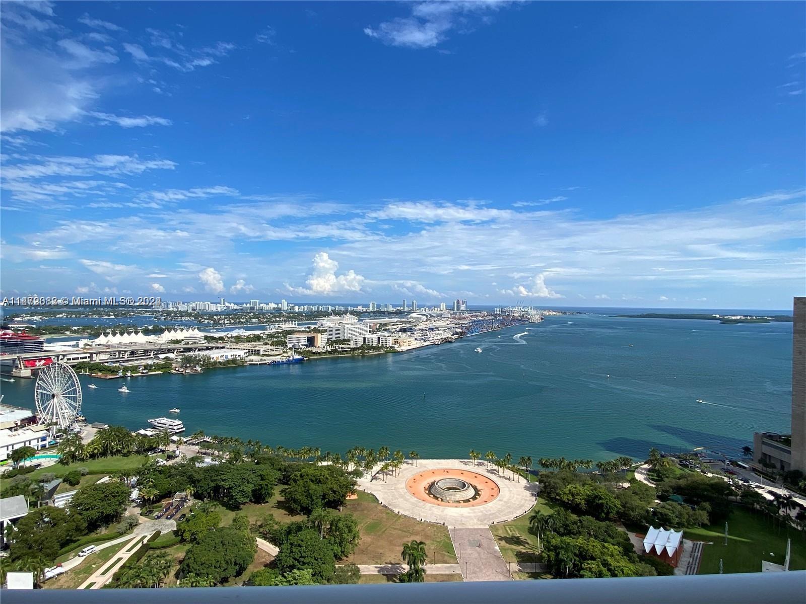 Enjoy luxury urban living from this spacious corner 3 bdrms 2 bths condo with direct water views of Biscayne Bay
and Miami Skyline. Italian kitchen cabinets with state-of-art appliances, modern baths with marble finishes.
Building amenities includes: 3-story lobby created by world-renowned Rockwell Group provides an inviting
ambience. Designed by the award-wining architectural firm of Sieger; Over 15,000 retail space, 24 hours valet,
concierge, a nd security, 10th floor infinity edge pool, Jacuzzi, lounge beds and cabanas, 2-level party room and
clubroom. On the 12th floor residents enjoy a 2-level spa and fitness center, along meditation and Pilates rooms.
Centrally located in Miami, residents are within minutes to SoBe, Grove, Gables, Brickell, Airport & Design District.