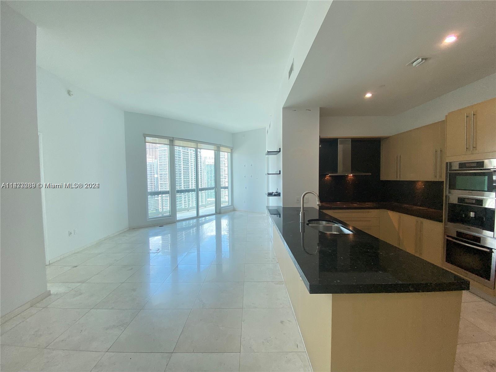 Magnificent bay front condo in Asia at Brickell Key offers 2 bedrooms, 2 1/2 baths, laid over 1,326 SqFt. Marble flooring through-out, 12 Ft ceilings, custom walk-in closets, expansive kitchen w/ Miele appliances. 2 parking spaces and storage unit included. Freshly painted. . Building amenities include: Tennis courts, pool, gym, sauna, steam room, basketball/racquetball court. Building undergoing exterior maintenance; balconies will be inaccessible. Easy to show!