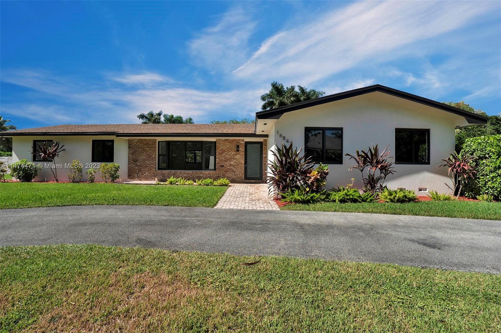 Luxury Home for Sale in Palmetto Bay 
This beautiful and spacious 4-bedroom, 2-bathroom luxury home in Palmetto Bay is a must-see! With 3,077 square feet of living space, this exquisite property offers a perfect blend of elegance and comfort. 
Key Features:
- 4 bedrooms for all your family's needs.
- Two modern bathrooms with high-end finishes.
- Wood floors throughout the house, adding warmth and charm.
- Impact windows for added protection and security
- A stunning screened-in pool with guarantee and brick paved flooring 
- Roof with a guarantee, providing you with peace of mind.
- A spacious and huge lot, offering endless possibilities for landscaping and outdoor activities.
- Expansive green grass surrounding the property for outdoor play and relaxation.