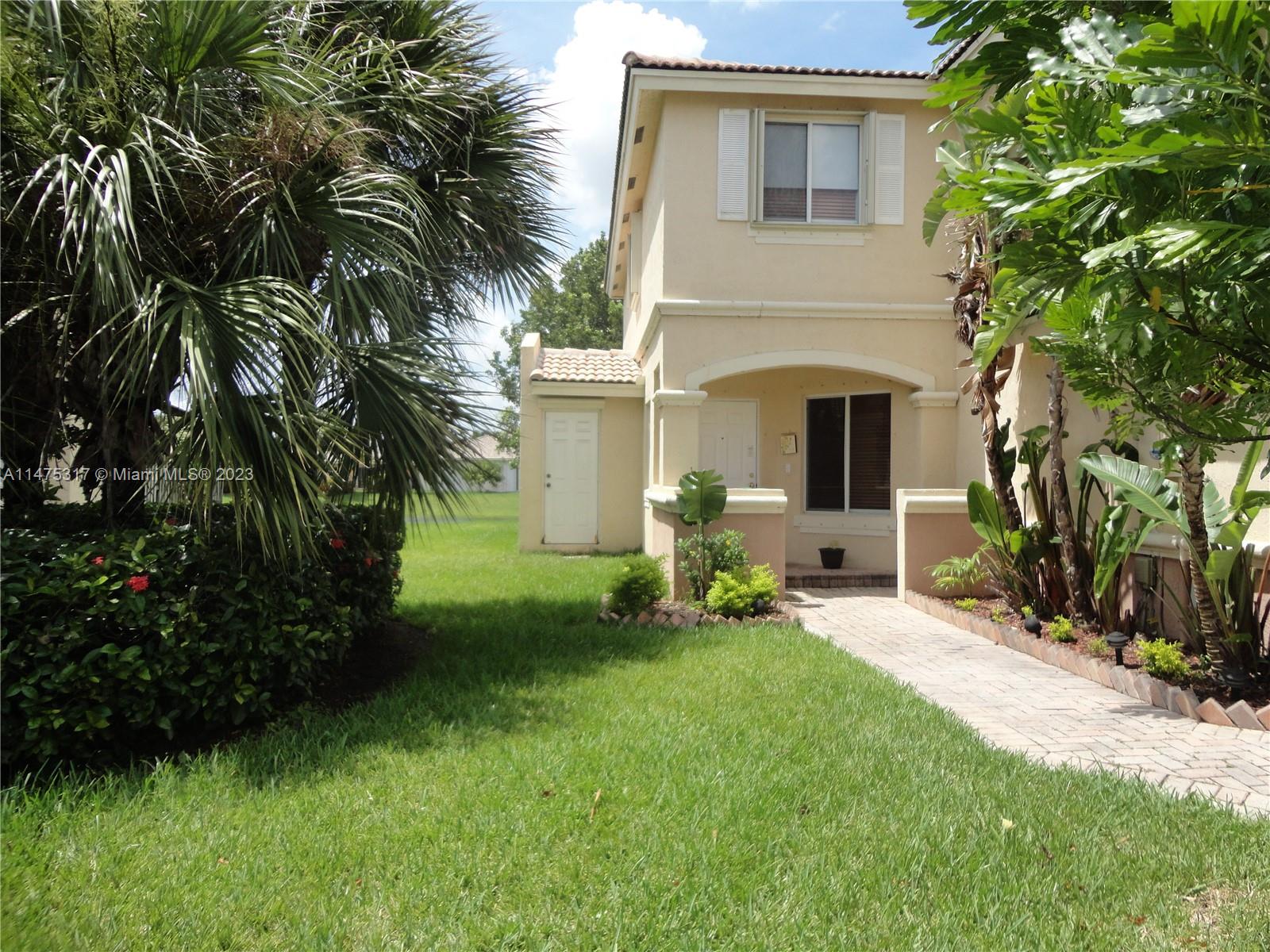 IMMACULATE CORNER UNIT IN THE WEST KENDALL COMMUNITY. FEATURING A WONDERFUL VIEW TO THE LAKE FROM YOUR FULLY FENCED BACKYARD, 3 BEDROOMS AND 2.5 BATHROOMS AND AN EXTRA DEN FOR AN OFFICE OR ENTERTAINMENT ROOM, COMBINATIONS OF CERAMIC FLOORS ALONG WITH WOOD/LAMINATE FLOORS IN THE FIRST FLOOR AND SECOND FLOOR, UPDATED STAINLESS STEEL REFRIGERATOR, STOVE, AND MICROWAVE, LIKE NEW WASHER AND DRYER IN ITS PRIVATE UTILITY AREA. ONE CAR GARAGE AND YOUR OWN PRIVATE DRIVEWAY