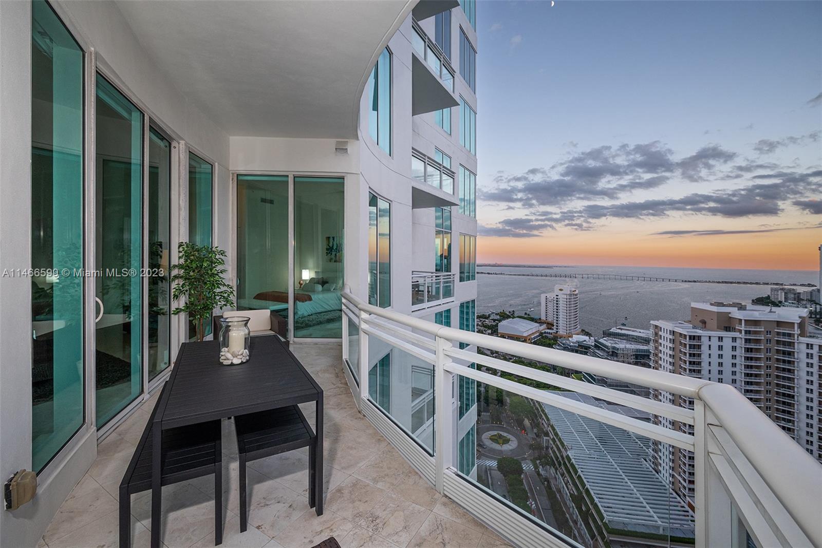 Set in the world-class gated island of Brickell Key, this 27th floor 2/2.5 split floor plan unit at the Asia Brickell Key can be yours. Just east of the Miami Brickell area, it offers a waterfront ultra-luxurious lifestyle, private elevator w/bio-metric secure controls that opens to a foyer, 12' ceilings & marble floors. The balcony overlooks the skyline, river & Biscayne Bay. Others: smart home, floor-to-ceiling windows, Subzero fridge, Miele kitchen, Bosch W/D & custom closets. Primary bath w/marble shower, Jacuzzi & WC. An extra storage room & 2 tandem garage parking spaces. Amenities: 24hr security/front desk, lobby, fitness center, pools, sauna, racquetball/basketball, tennis court, valet for guests, meeting room. Partially furnished by Artefacto. Only 1 owner rarely used as 2nd home.