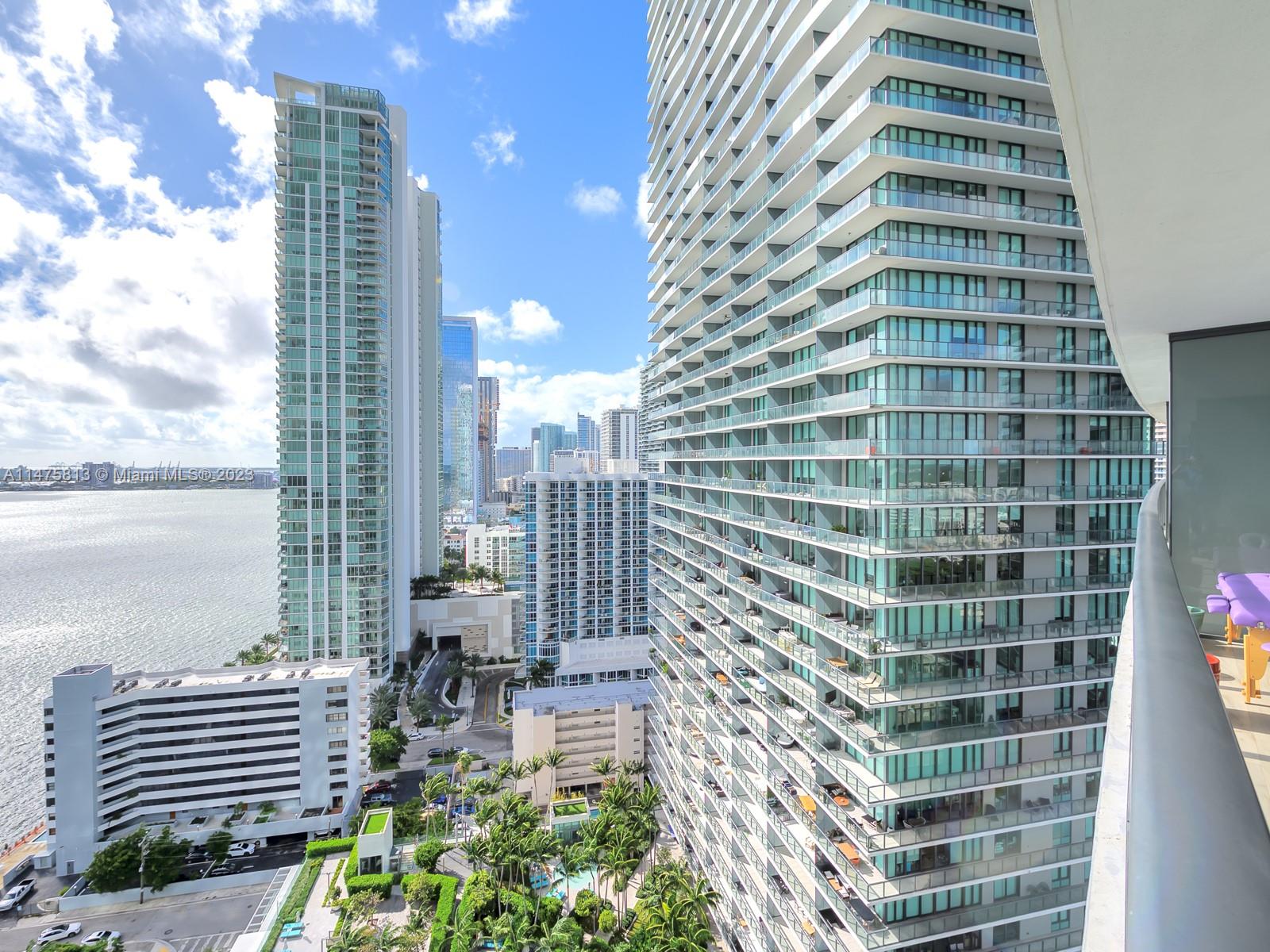 Infinite bay views and sunrise from your extended balcony and master bedroom. Floor to ceiling 9f. impact sliding doors. 2 bedrooms, den and 3 bathrooms. Private elevator and ready for you to move in. Upgraded with closet cabinetry and beautiful tile. Bosch and Subzero appliances. Paraiso Bay is at walking distance to parks, marina and the waterfront restaurant Amara. State of the art amenities, infinity pool, golf simulator, tennis court, gym, sauna, business center, children playroom, cigar bar and more.