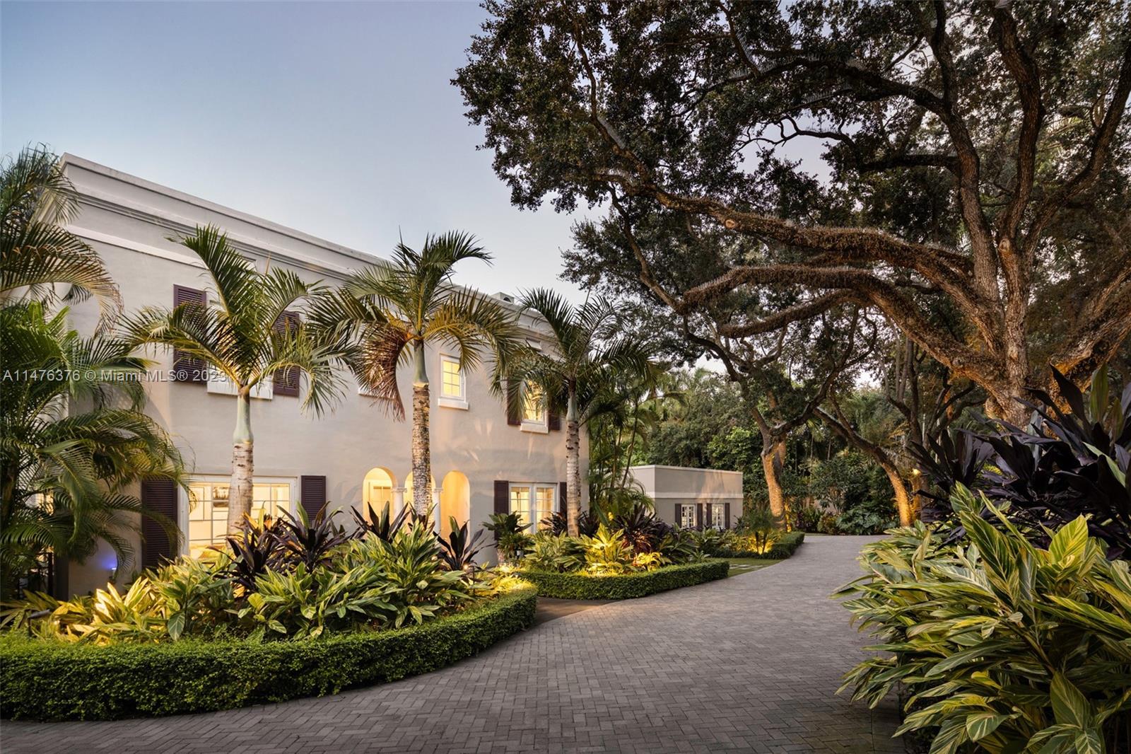 A rare opportunity to own an extraordinary, luxurious, private paradise on the most sought-after street in Coconut Grove-Leafy Way. This spectacular estate, completely rebuilt in 2017 sits on a majestic 28,314 sq ft lot.This home boasts endless sunlit spaces throughout its open layout and exudes warmth and sophistication, with indoor living spaces flowing effortlessly to the expansive outdoors.Mature trees shade the spectacular pool and garden. A home without compare, with a glamorous 'movie-set' pool that is luxurious, secluded and basks in natural splendor. Guest house offers versatility as office, guest suite, or in-law quarters.Located outside the flood zone and equipped with a 38kw generator, providing peace of mind. A dazzling gem to complement your luxurious, refined lifestyle.