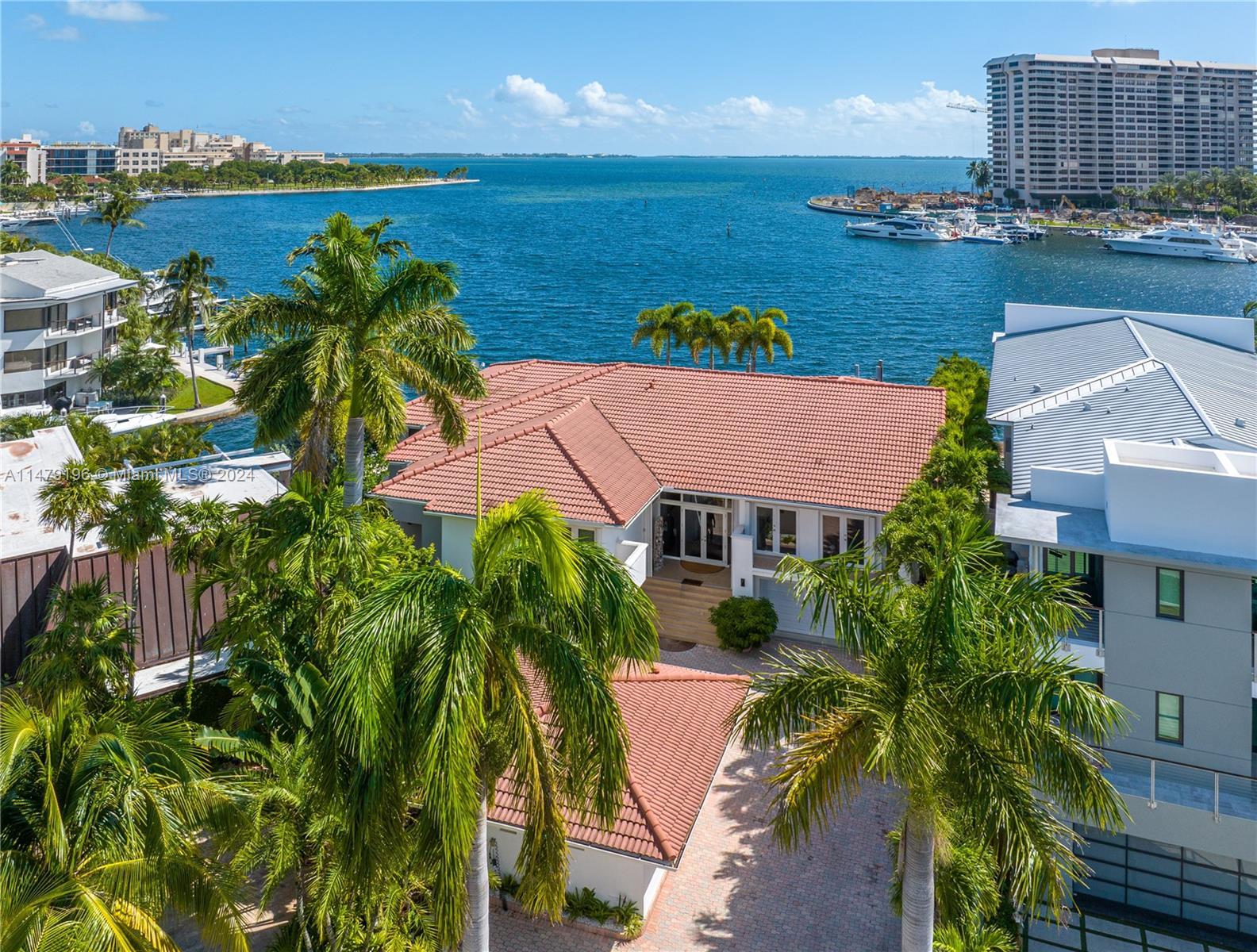 Serenity on the Bay-Coconut Grove waterfront. Once in a lifetime, a cherished bayfront residence emerges from downsizing Sellers. Extraordinary property offers many possibilities; enjoy its current comforts, add updates, or completely redevelop. Set on a remarkable 139 ft wide bayfront lot with rare substantive dockage*, it is a sanctuary for water enthusiasts & boat lovers. 8 BED, 10.5 BATH In total, plus a separate guest house studio. Upstairs: wide bay views from a skylighted foyer w/volume ceilings, formal living & dining rooms, atrium-style eat-in kitchen, family room, den/office, and 4 BD including the split primary bedroom, 4.5 BA. First level: wide bay views, completely renovated; media room w/screen and surround sound, pool table room, pool deck & summer kitchen for R&R; 4BD/6BA.