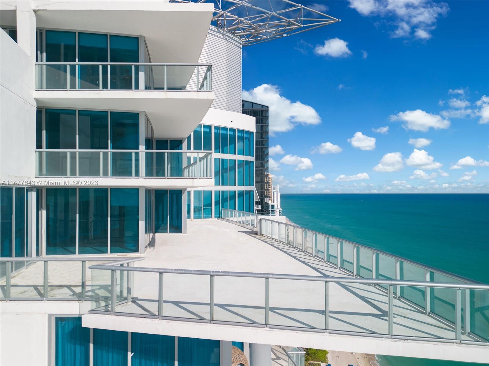 Secret sanctuary —a one-of-a-kind, 14,000 sq ft Tri-Level Penthouse. Revel in unobstructed, panoramic 180-degree vistas of the Atlantic Ocean and Intracoastal. Nestled on the Southeast corner of Jade Beach, this three-story Penthouse boasts five-bedrooms and six-and-a-half bathrooms. Each room offers spectacular floor-to-ceiling views. Delight in approximately 5000 sq ft of balconies and terraces, ensuring each bedroom has access to a private outdoor space. Ascend with ease using the private elevator within the unit. And for the ultimate relaxation, bask in the views from the private jacuzzi. The Penthouse will be delivered designer ready with architectural plans.