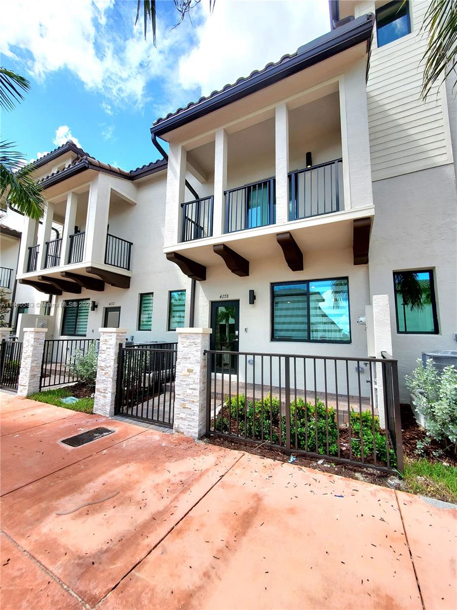 Stunning 3-beds Townhouse in Vibrant Doral Community! Beautiful 2-story townhome located in Miami. 1,431 sqft and boasts 3 spacious beds and 2.5 baths. The luxurious and spacious master includes a large walk-in closet, wooden flooring, and large windows that bathe the room in natural light. Relax in the tranquility of nature from your private balcony. The kitchen is a cook's dream with ss appliances, elegant wooden cabinets, and an eat-in counter. It is further enhanced by quartz countertops. A fully equipped laundry room and an attached 2-space garage. As for smart features, the property is equipped with smart doorbells, lighting systems, and locks, offering a secure, comfortable, and technologically advanced living environment.