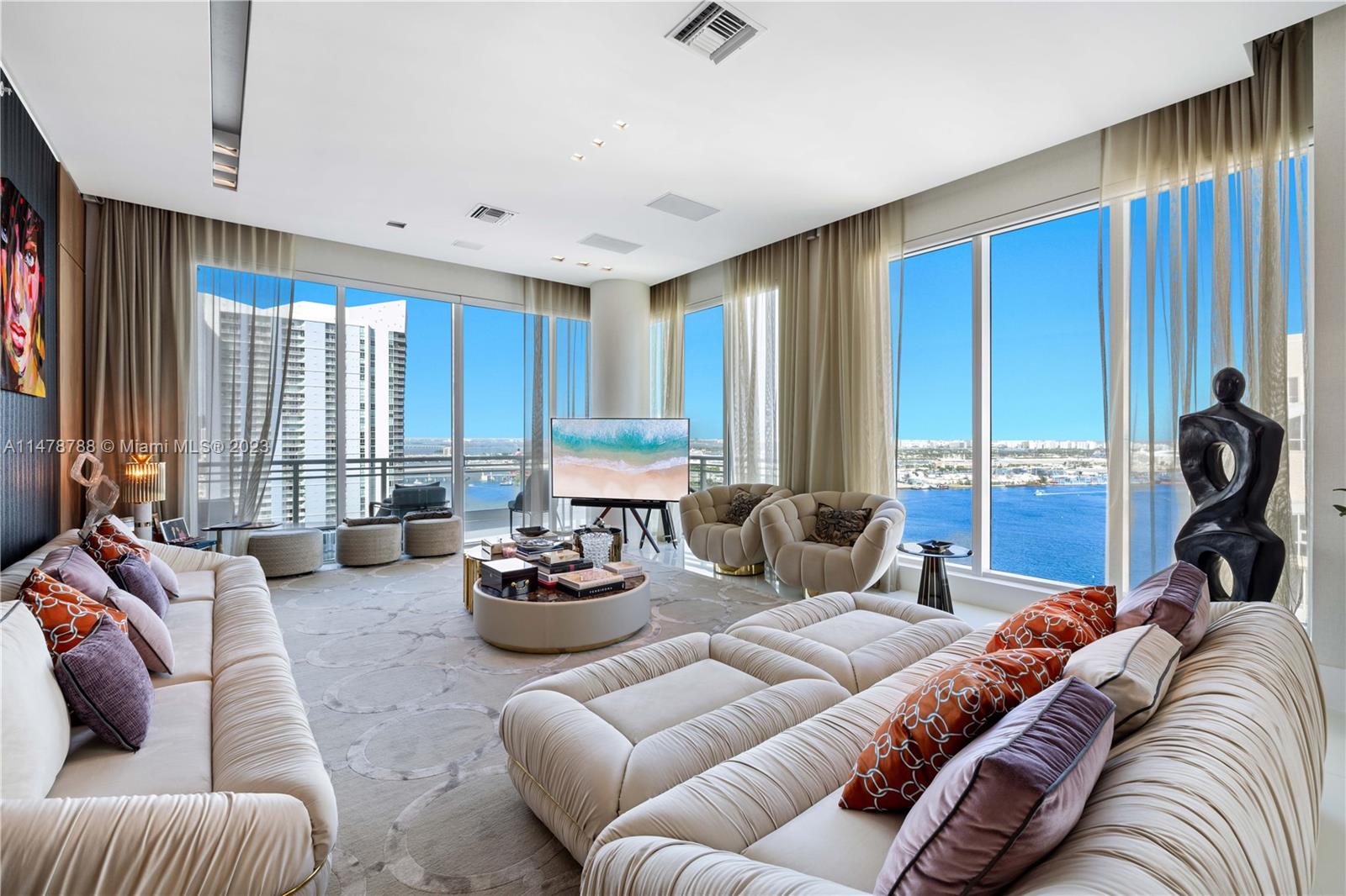 The #1 Most Exclusive & Luxurious Residence For Sale - A true 'MANSION IN THE SKY' in the heart of Brickell, yet on the exclusive Island of Brickell Key-"An Island within The City". This gorgeous residence features 4-bedrooms, 5-full & 1-half baths plus an office. Soaring 12ft ceilings, private elevator, stunning water & city views. Live the "Island Life" & walk to the hustle & bustle of Brickell: Shopping, Entertainment, Restaurants & The Brickell City Centre! 2 Premium Parking spaces + Valet & storage unit. Asia is Brickell Key's premier luxury building w/ all of the 5-star amenities. Unit was professionally done and decorated with over 1.0 million in improvements . See virtual tour . See the Matterport