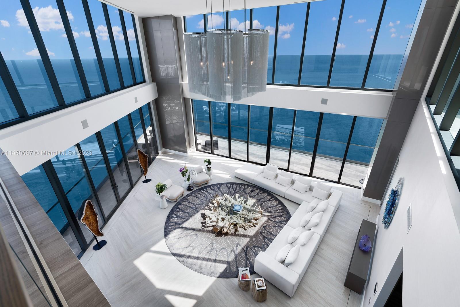 IT IS FINALLY READY! THE WAITING IS OVER! INTRODUCING THE ONE & ONLY PENTHOUSE #00 AT RESIDENCES BY ARMANI/CASA. EXQUISITE CRAFTMANSHIP, SHEER BEAUTY, & BREATHAKING VIEWS OF THIS TIMELESS CORNER 2 STORY PENTHOUSE ARE READY TO BE SEEN & AVAILABLE TO A BUYER WHO WANTS THE VERY BEST.BE CAPTIVATED BY THE EXPANSIVE OPENNESS & SOARING 20 FT CEILINGS THAT FEATURE OVERSIZED WINDOWS WITH SPECTACULAR OCEANVIEWS, INTRACOASTAL WATERWAY VIEWS & CITY VIEWS - AS FAR AS YOU CAN SEE! RELAX IN THE HUGE SPACIOUS LIVING ROOM; ENJOY THE ENORMOUS WRAP AROUND OUTDOOR BALCONY. "THE BEST VIEWS ON THE BEACH". OVER 8,700 TOTAL SQ FT, 5 BRS ON TWO LEVELS. SECOND LEVEL FEATURES CUSTOM LIGHT UP ONXY BAR, MOVIE AREA, AN OUTDOOR "BACKYARD" SPACE WITH YOUR 0WN POOL AND SUMMER KITCHEN. MUST SEE!