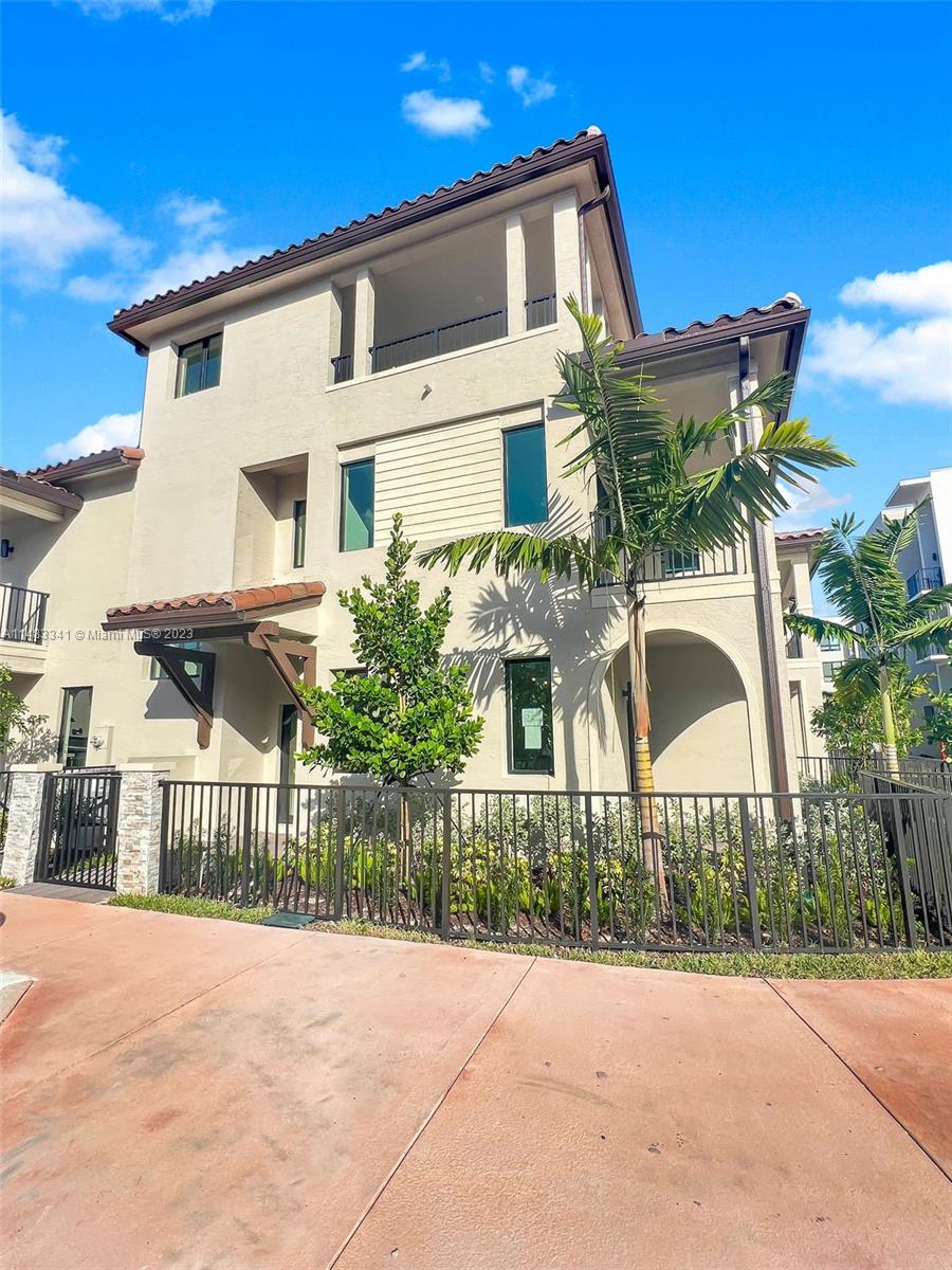 Modern and Beautiful 4 story Corner townhome - Resort style, located in the desirable Downtown Doral, with sky view! This home features 3 bedrooms, 3 bathrooms, 2 half bath and 2 car garage. This great community offers incredible amenities for the whole family including Clubhouse, Fitness Center, Pool and much more. This property is in the perfect location with proximity to major highways, shops, trendy restaurants, great charter schools, and parks.