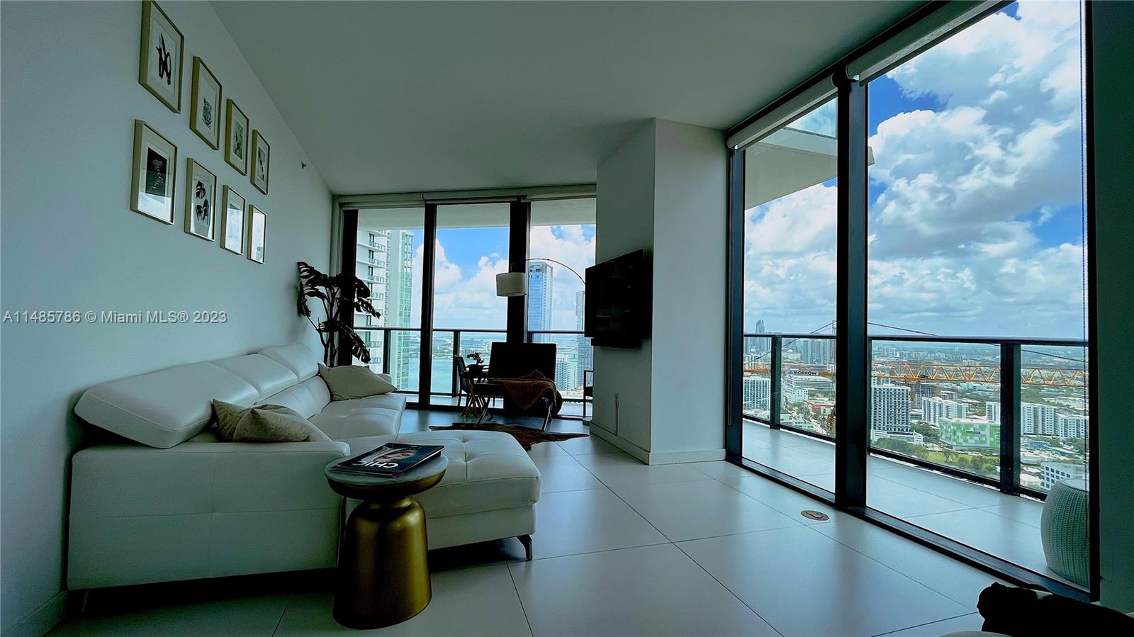 Spectacular Sunsets and City and Bay Views. Corner unit  2-2 + DEN. Wrap Around Balcony. floor to ceiling Impact windows.. Ceramic floors, dressed Closets and high end Window Treatments. Washer and Dryer in the unit and Amazing first class amenities . Roof top Pool , Tennis and Basket Ball courts, Billiard and Movie room, Children play room , Gym, Spa and much more. 10 min from Miami Beach, 5 min to Wynwood , Midtown and Spectacular Design District and the Arts District. Easy access to several high ways . The Revive Paraiso District is the Center of Everything in Miami. Send your Offer !! 
Unit Tenant Occupied,  use Showing Assist  Available January 12, 2024