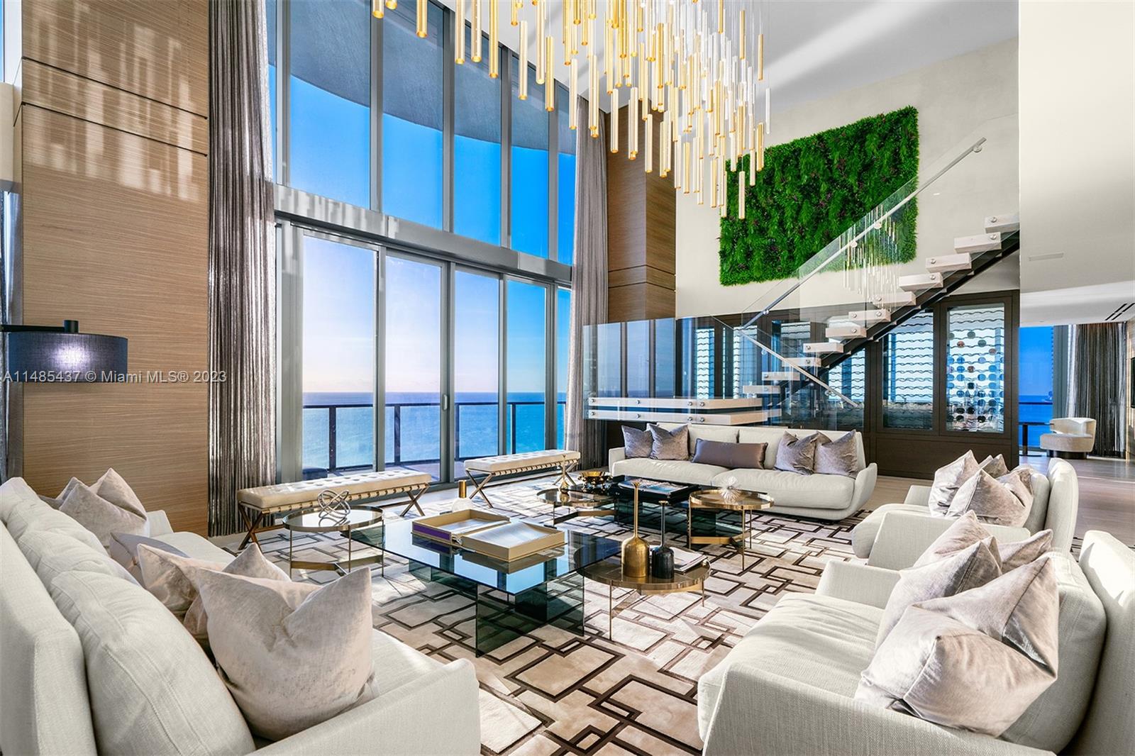 Introducing the Regalia Penthouse, a masterpiece offering limited edition living on the Ocean in Sunny Isles Beach. Encompassing 10,755 SF of living space, this residence is furnished with the world's finest materials where quality & style define the interiors. With a private pool & 2 levels of unobstructed panoramic views, including the Atlantic Ocean, pristine beaches, Intracoastal Waterway & Miami Beach skylines. This home in the sky features a stunning European kitchen with chef island & Miele cooktop, a 500-bottle wine cellar, private movie theatre, and an all marble spa like expansive primary bathroom with two stunning showers and best in class finishes. Enjoy sunrise & sunsets from this elegant residence, the last oceanfront parcel in Sunny Isles.