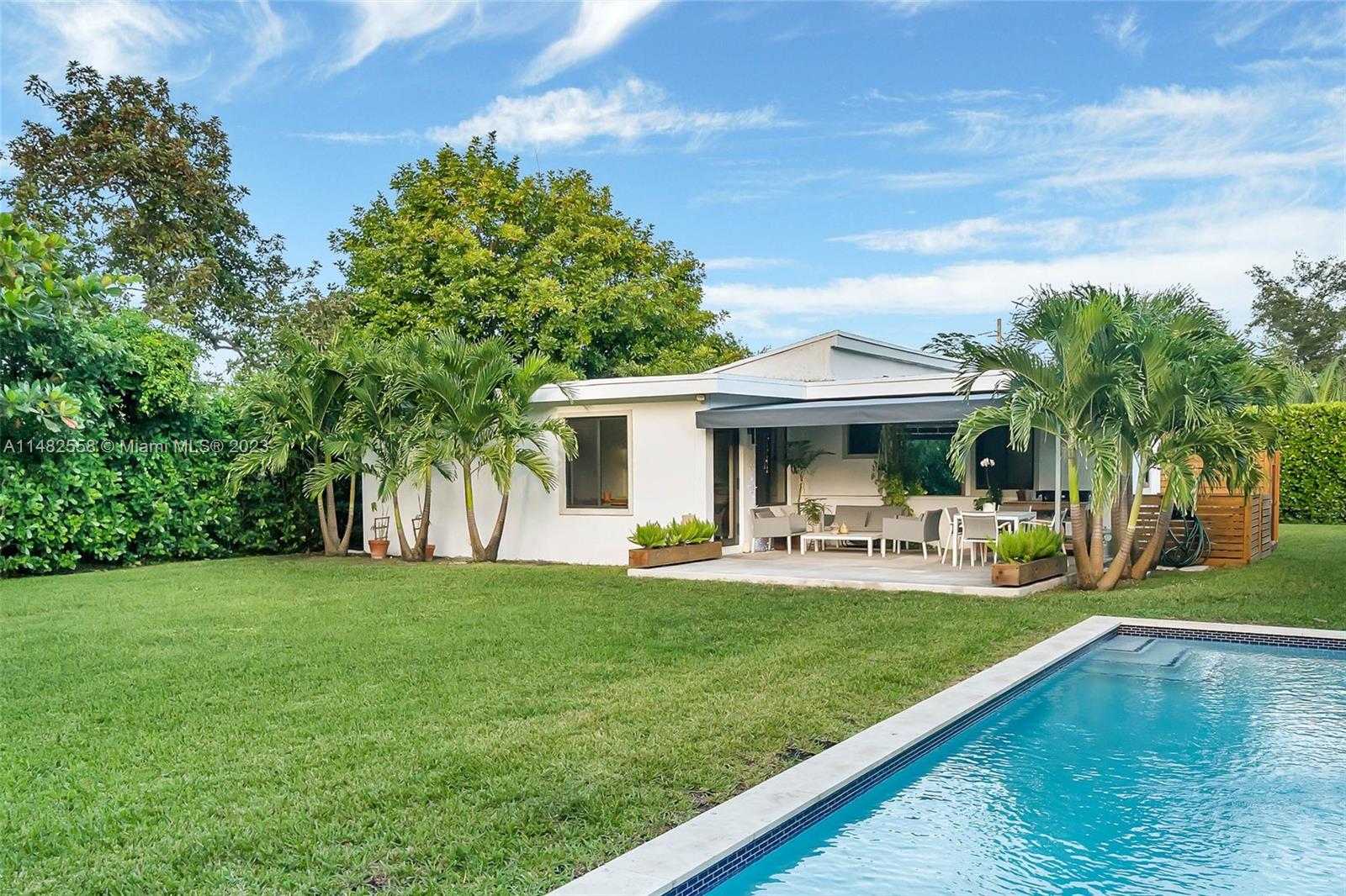 Welcome to this stunning, move-in ready pool home on a 10,800 sq ft lot in the heart of South Miami. This immaculately maintained residence features light-filled living spaces, a brand new pool, outdoor shower and expansive garden. The newly renovated kitchen, 3 bedrooms, and 2 modern-style baths with frameless glass shower enclosures provide a luxurious touch. 2019 total renovation- new roof, updated electrical and plumbing systems, and impact windows throughout. Step outside to your own private oasis – a covered terrace overlooking the oversized, fenced backyard and a sparkling pool. Located in a quiet neighborhood, this property is just moments away from vibrant South Miami.