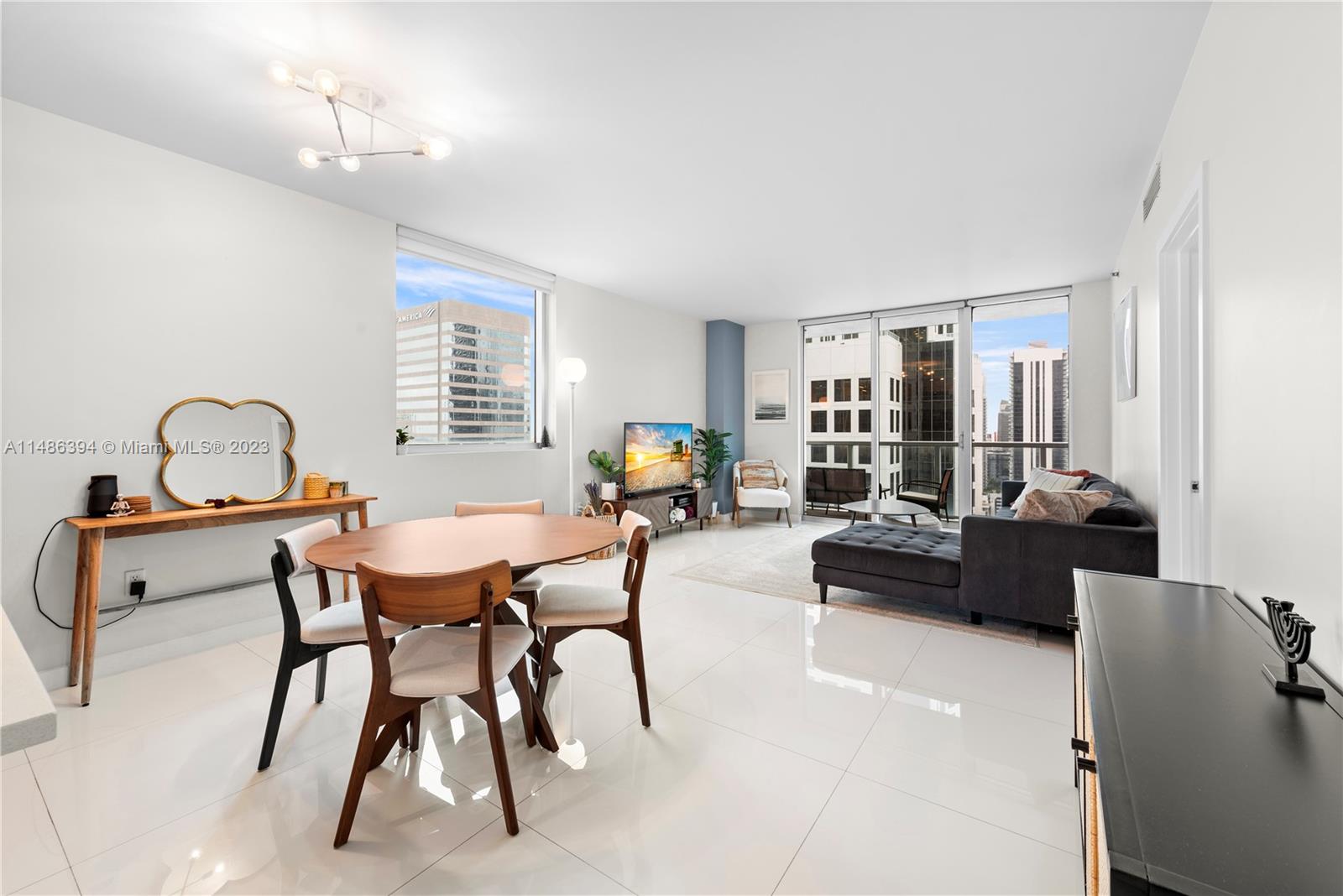 Beautifully renovated, light-filled corner unit on the 33rd floor at the iconic 500 Brickell. This one-of-a-kind unit features 2 beds+den+2 baths. The unit was redesigned to include a den – ideal for a home office - and a second walk-in closet in the master bedroom. Porcelain flooring throughout. The kitchen features stainless GE Monogram and Bosch appliances. The balcony spans the length of the unit – perfect for lounging and outdoor dining. 500 Brickell offers 24-hour reception/security/valet; 3 heated swimming pools; fitness center; spa with a jacuzzi, sauna, and steam room; private movie theater; and multiple resident lounges and workspaces. Located in the heart of Brickell steps from shopping, restaurants, and entertainment. Available Furnished or Unfurnished. Available April 1, 2024.