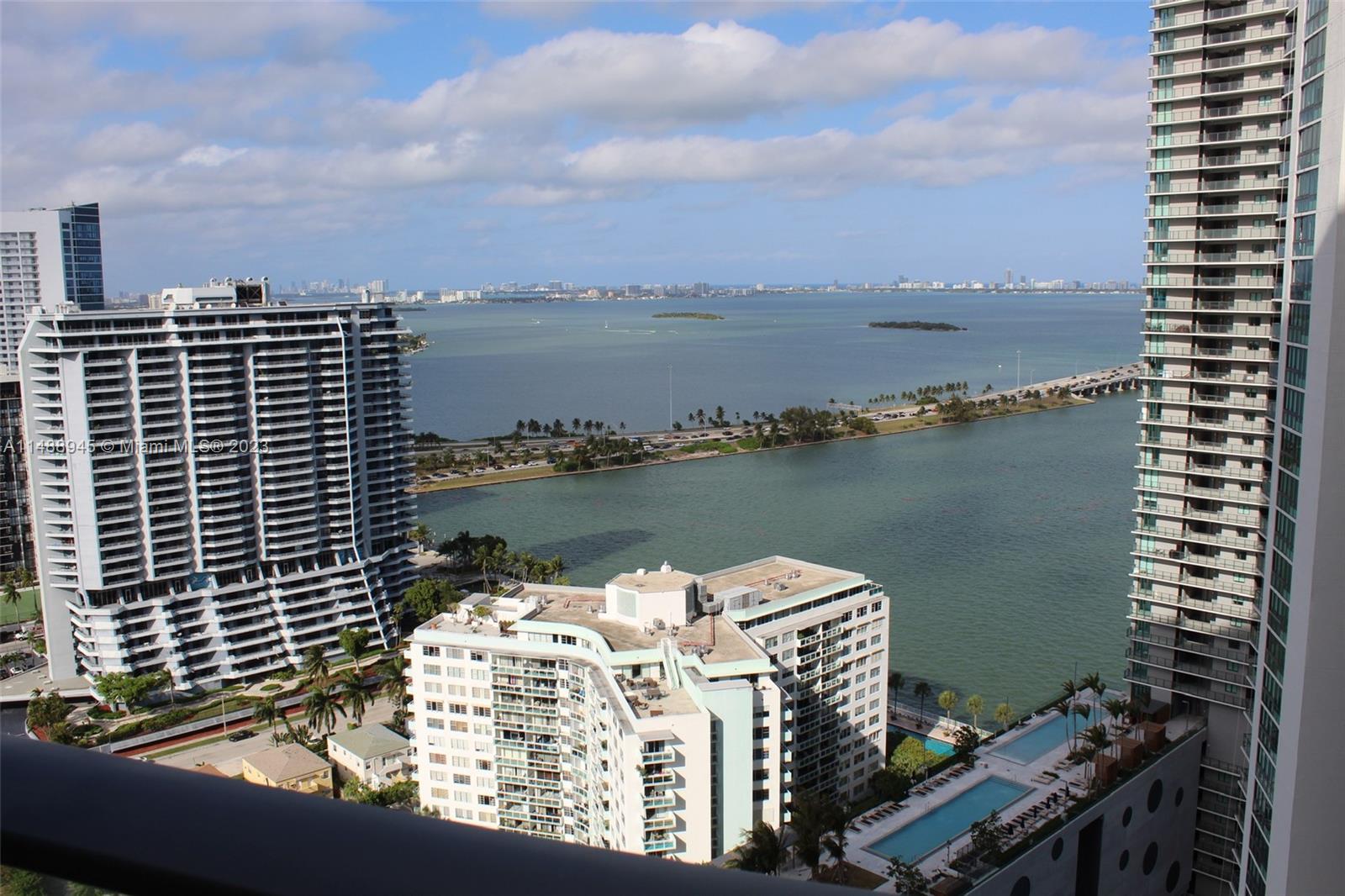 Beautiful unit 1 Bed / 2 Bath at Paraiso Bayviews, this unit is one of the biggest as its located on the architectonic bubble of the building making the sq ft greater than the others even in the same line. Its a one Bed and the master Bath shares the shower area with the other bath, making it a great way to have 2 full baths on a single Bedroom unit. Its upscale finishes and the view are breathtaking, just iamgine you can see Miami Beach from your kitchen, you can also enjoy the rooftop swimming pool with glass handrails, allowing you to enjoy the view out to open sea from inside the pool. Amenities; it has them all, from tennis courts, BBQ Area, a state of the art Gym, and the decoration is by an award winning designer, Karim Rashid.