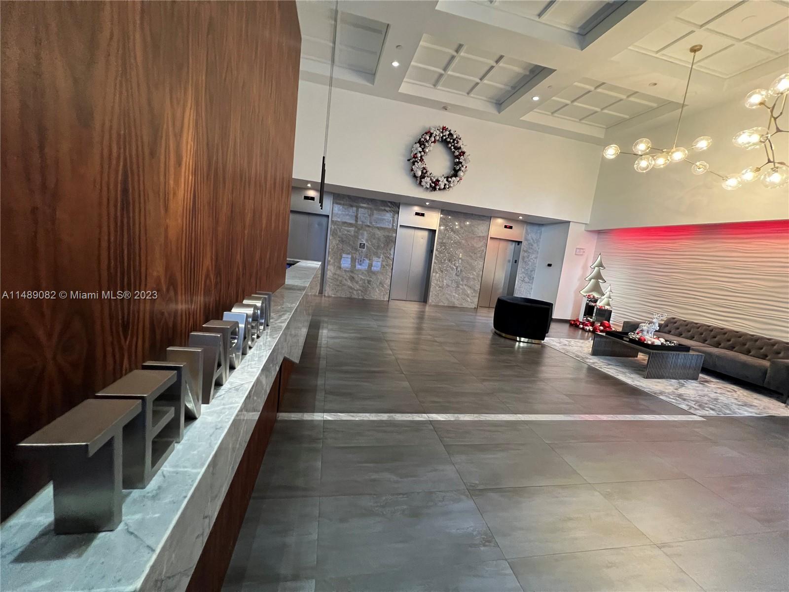 Stunning 2-bed, 2-bath condo boasts nearly 1200 sq ft, showcasing gorgeous wood floors, stainless steel appliances, Italian cabinetry, marble countertops, in-unit washer/dryer, and modern amenities. Luxurious marble bathrooms feature frameless glass shower doors, complemented by contemporary sinks. Enjoy ample space with a walk-in closet and a well-designed floor plan in this corner unit, offering a beautiful view of the pool and the city. Ten Aragon, a premier condominium in the heart of Coral Gables, offers a prime location for a vibrant walking lifestyle, surrounded by restaurants, bookstores, and more.