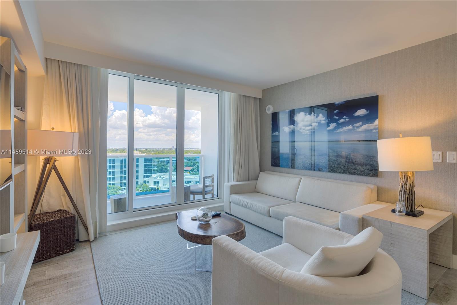Embark on a lifestyle of luxury in this fully furnished and stocked 2-bed, 2-bath condo, featuring mesmerizing skyline views. Immerse yourself in daily sunsets and enjoy exclusive amenities like a 14,000 sq. ft. gym, spa, and chauffeured electric cars. Reside in one of Miami Beach's most prestigious addresses, relishing resort-style living, a private rooftop pool and bar, four restaurants, and more. In partnership with Five Star Luxury Travel, this property not only ensures opulent living but also presents a compelling investment opportunity with remarkable rental income. Make this condo your own for a life of lavish comfort—it's ready for immediate rentals, fully furnished and stocked, adding an extra layer of convenience to its allure.
