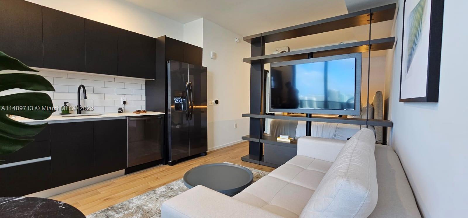 Discover modern luxury at The Elser Hotel & Residences in the heart of Miami. This fully furnished 26th-floor unit features 9-foot ceilings, floor-to-ceiling windows with panoramic views, a private balcony overlooking the Miami skyline and Biscayne Bay, porcelain tiles, in-unit washer/dryer, smart keyless entry, and a smart thermostat. Enjoy exclusive amenities like a 132-foot resort-style pool, private lounge areas with a poolside LED wall, a sky lounge, and a gym. Embrace a lifestyle with easy access to top-notch entertainment, arts, and dining. The epitome of Miami living awaits you.