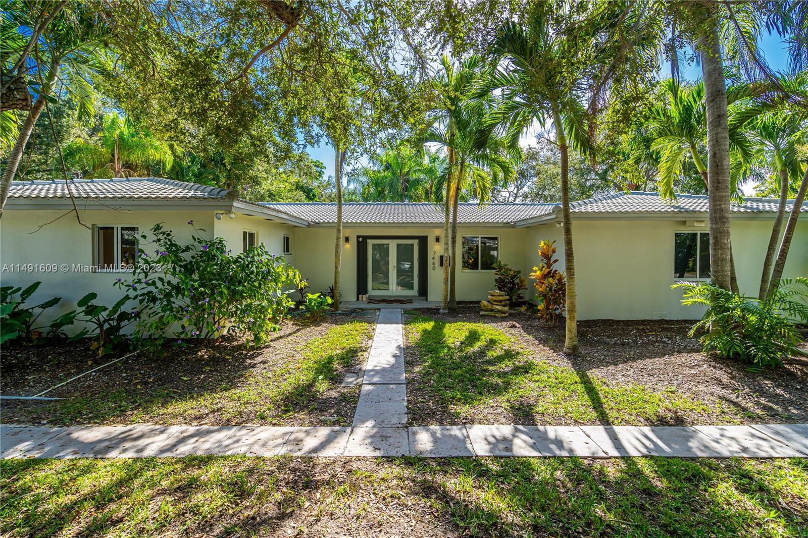 Seller's spared no expense when redesigning this home. Beautifully updated with natural modern touches, this CORNER single-family home sits at the best location in Palmetto Bay! Property features new electrical & plumbing, impact windows & doors, new AC  and much more. Septic Tank & roof are in perfect conditions. Kitchen has been beautifully updated with black marble counter tops with hidden compartments. Right off the kitchen sits a silent retreat where you can enjoy a hot cup of tea and your favorite book. Master bathroom has been redesigned to include a clawfoot tub perfect for relaxation. All new floors, updated guest bathroom, upgraded garage with new flooring and storage. PLEASE NOTE: 4th bedroom has been converted to a large walk-in closet in primary bedroom.