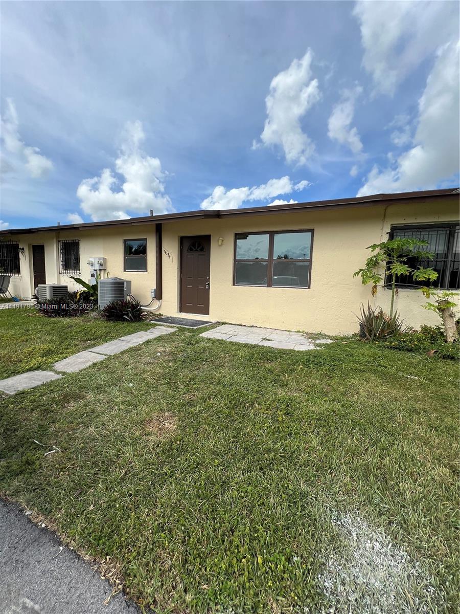 2 Bed, 2 full baths, completely renovated, Tile floors, high impact windows. W/D and new stove will be installed inside the unit prior to closing. Large walk-in closet in primary bedroom.  Small patio perfect for entertaining. NEW roof and AC. LOW HOA fees. Won't last long. Close to transportation, shopping and great schools. Great Investment opportunity. Can be rented for $2000 or more.