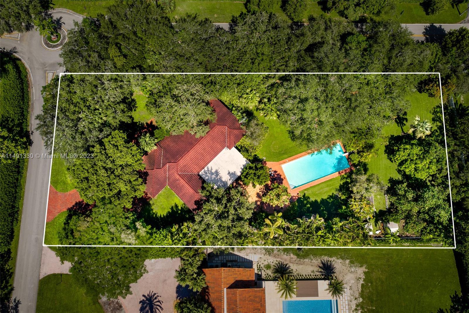 Located in Glenvar Heights, this charming 4-bedroom, 3-bathroom pool home is situated on a spacious corner lot spanning .93 acres. This property offers an abundance of outdoor space with mature oak + fruit trees providing a serene and picturesque setting. This home is the perfect opportunity for builders + buyers to customize the space to their particular needs + design preferences.

Enjoy the convenience of nearby amenities in South Miami and the Dadeland area, including shopping, dining, and entertainment options. 

Don't miss out on the incredible opportunity to transform this property into your dream home. With a blank canvas awaiting your vision, this property offers endless possibilities for customization and personalization.