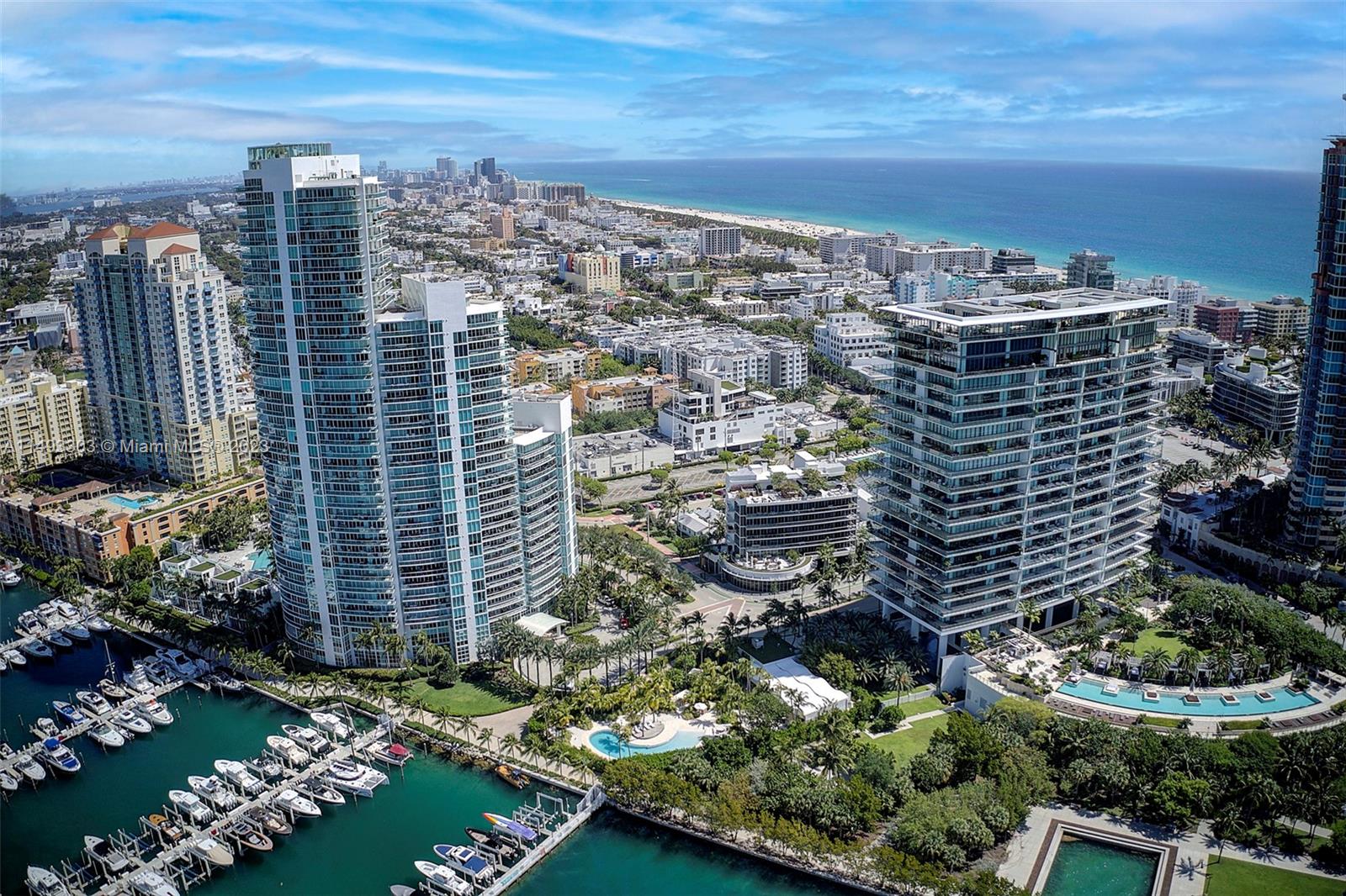 This unique unit offers breathtaking view of the Bay, Marina Yacht club and South Beach. The only one 1 bedroom unit available in this building. Building offers fitness center, 2 swimming pools, walking distance to the beach and World famous restaurants.