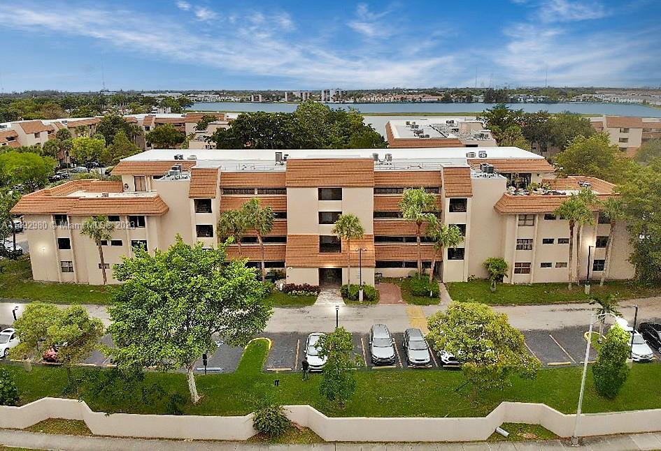 Spacious and Bright 2 Bedroom 2 Bathroom Condo located at Summertree village perfect for those seeking a relaxed lifestyle. This condo has a huge master bedroom with 2 walk-in closets and master bathroom has roman tub & shower. The kitchen was remodel with a modern chic look and new stainless steel appliances. This condo will have you feeling right at Home! Enjoy Ultimate Comfort and Convenience with a brand new central air conditioner and washer and dryer. The community amenities include a beautiful pool, relaxing cabana area with lake view, clubhouse, gym, and a barbecue/picnic area, 24/7 Security gated community. Conveniently located sear shopping centers, major roads and Aventura area!  Building exterior is going through some renovations. Rental restriction of 2 years owned.