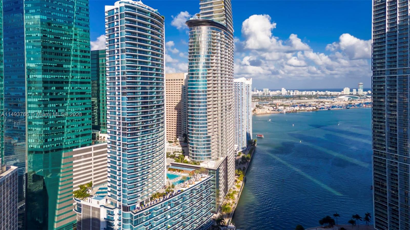 Spacious, waterfront 1/1.5 at EPIC Residences by Ugo Colombo on a high-floor. Best Rooftop Pool in Miami. ZUMA on-site.  Walk into Brickell.  Whole Foods next-door. 10 min to Miami INTL Airport and 10 min to Miami Beach.  Enjoy breathtaking views of Biscayne Bay, and Brickell, from your private waterfront balcony, and soak in the fun all weekend at Area 31, featuring two rooftop pools on the waterfront with restaurant and bar.  Bathroom features jacuzzi tub with rain forest shower.