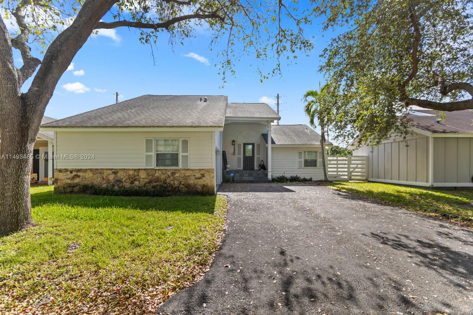 Welcome to Country Walk!!! Your property is a split level, 2 story house. As you walk in, you notice the openness of the living room. Adjacent is the dinning room and to the back is one the Florida room along with the master bedroom.  The kitchen area doe have an opening to one of the Florida rooms, but it does have the other Florida room nest to it. Three impact sliding doors lead to the concrete porch. Two rooms upstairs share a small area that can be used as a studio or a "hang out" place. Ring camera and alarm system stays. Tankless water system and hurricane compliance garage door. Impacts windows on the first level. Area is kept neat with common areas like clubhouse, pool, trails and lakes.