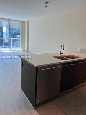 Available January 16, 2023. Large 1 bedroom/ 1 bath condo at 500 Brickell West tower. Open kitchen with quartz counter top, stainless steel appliances, washer/dryer, walk-in closet, full size jacuzzi tub and shower. The building is a full amenities building with 2 pools, hot tub, spa, fitness center, theater, business center & community room, valet parking and concierge. Close distance to restaurants and shops, Brickell City Centre & Mary Brickell Village. 24-hour Security and Concierge,24-hour Valet Parking,High-speed Elevators,42nd Floor Rooftop Heated Pool, Sundeck, Club Room and Bar, 11th Floor Infinity-Edge, Heated Pool, Poolside Cabanas and Daybeds State-of-the-Art Fitness Center, Sauna and Steam Rooms,Hot Tub,Formal Club Room Sports Room, Theater Room