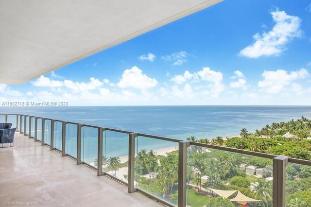 RARE IN MARKET!
 This 4br/7.5ba unit boasts a giant wrap around terrace with breathtaking views of turquoise sea and Miami city lights. This high-floor 01 unit (3,791 SF + 2,000 SF terrace) is available for rent for a 1-year lease or on a short-term basis (3-6 months). A private elevator leads up to a flow-through floorplan w/a perfect kitchen for hosting with all Italian Miele appliances, one touch black-out in all rooms, and an elegant limestone floor that was recently polished. Resort style living with 5-star amenities including 500-foot of private beach, world class restaurant, 2 pools, ocean view fitness facilities, spa, tennis, valet and 24/7 reception and concierge services. Absolutely amazing views and building amenities.
