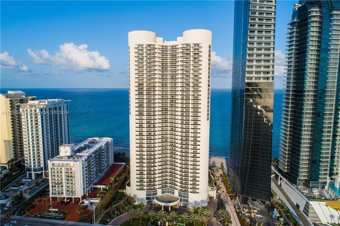 SIGNIFICANT PRICE ADJUSTMENT! Spectacular 2/2.5 in the most desirable oceanfront building in Sunny Isles. Ocean 4 offers resort style amenities with full beach service. Rarely available 04 line w/ 1886 sq ft. under air & 2 balconies that have ocean and intercostal/city views. Open living areas have marble floors, with large great room that opens to the designer kitchen. The kitchen has Miele and Subzero appliances, granite counter tops and wood cabinets. Oversized master suite opens to 2nd balcony has 2 customized large walk in closets and a luxurious marble master bath with Jacuzzi tub. Washer/dryer in large utility room. Resort living with restaurant, fitness center, stunning lobby, valet parking w/24 hour security and walking distance to shops and restaurants. Everyday is a vacation!
