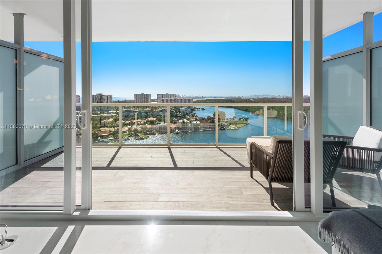 Discover the allure of 1904, the highest non-penthouse residence at 400 Sunny Isles. This 3-bed, 2.5-bath condo presents sweeping views of the ocean, Intercoastal waterway, and downtown skyline. Standout features include floor-to-ceiling windows, spacious kitchen with island, top-of-the-line appliances, and a generous primary suite/bath. 5-star amenities include two assigned parking spots, valet, marina, gym, spa, tennis court, bayfront pool, plunge pools, outdoor jacuzzi, and round-the-clock concierge service.