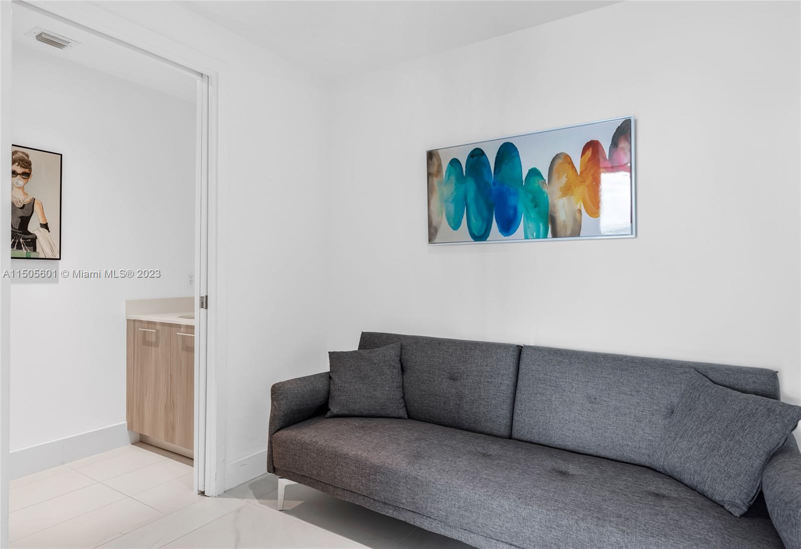 Den and half bathroom